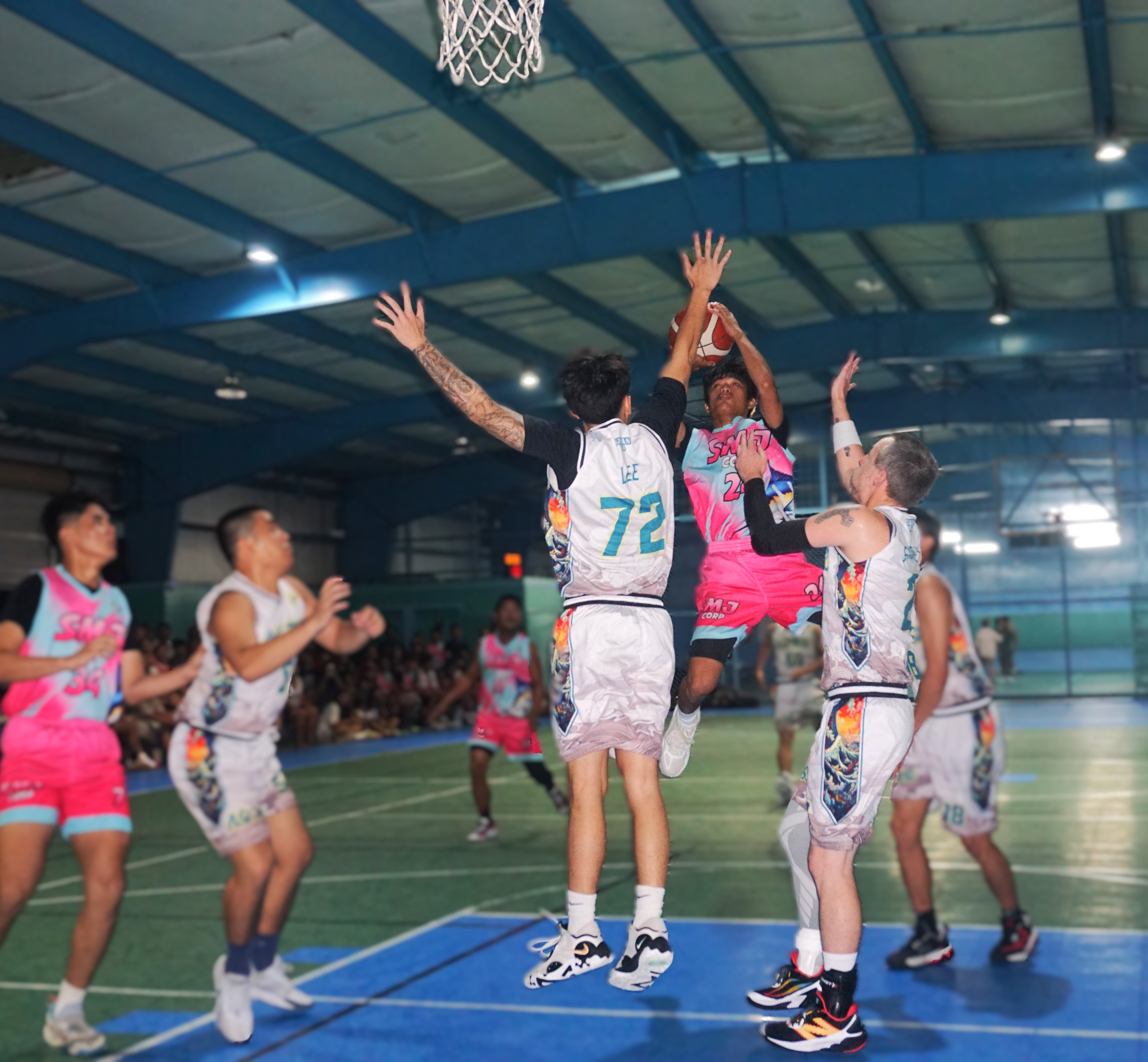 SMJ Corp's Khristian David takes the fadeaway jumper during the championship game against Alsa Baso in the semi open division of the Win Pacific Corporation Invitational Basketball League 2024 at the TSL Sports Complex on Sunday. 