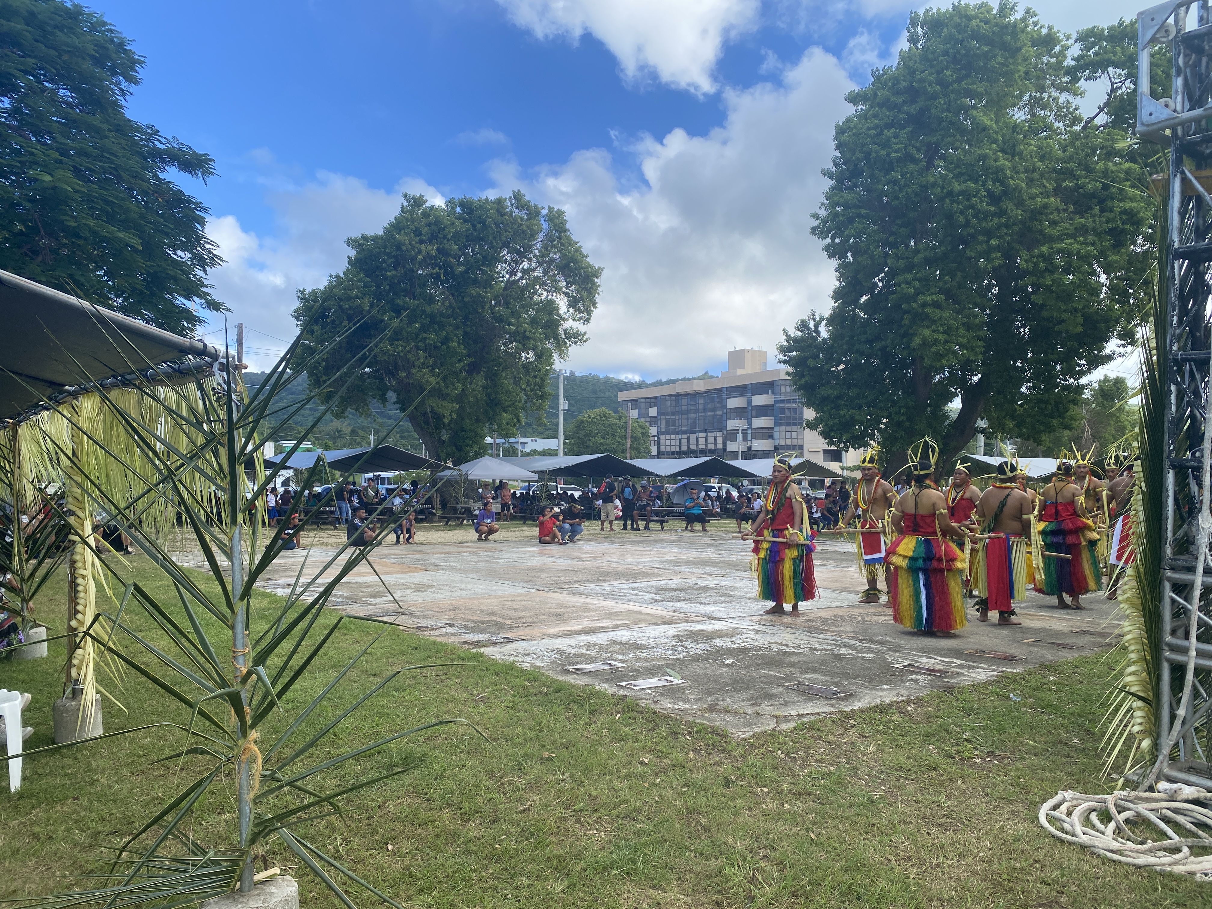 Yapese dancers, right, prepare to start their performance at Garapan Fishing Base during the Federated States of Micronesia Independence Day celebration on Monday.