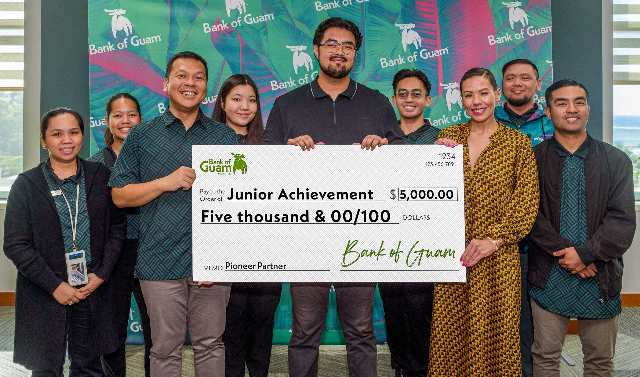 Bank of Guam supports Junior Achievement of Guam as a Pioneer Partner with a $5,000 sponsorship. All Bank of Guam employees pictured are proud mentors and advisors for the JA Guam Company of the Year program. Pictured, from left, are Abigail Uncangco, General Ledger Manager; Marie Luces, BSA/AML Officer I; Danny Daniel, Vice President, Director of Brand and Community Relations; Danielle Lee, Accounting Officer I (General Ledger); Joshua Miller, Executive Director, Junior Achievement of Guam; Michael Dedrick Sicat, BSA/AML Analyst I; Lesley Leon Guerrero, Senior Vice President, Chief Experience Officer and JA Guam Board Member; Marc Pilante, Management Trainee; and Bryan Paul Taijeron, Business Development Officer, all  from Bank of  Guam. (Not pictured are Advisor Travis Meno, Brand & Community Relation Officer I).