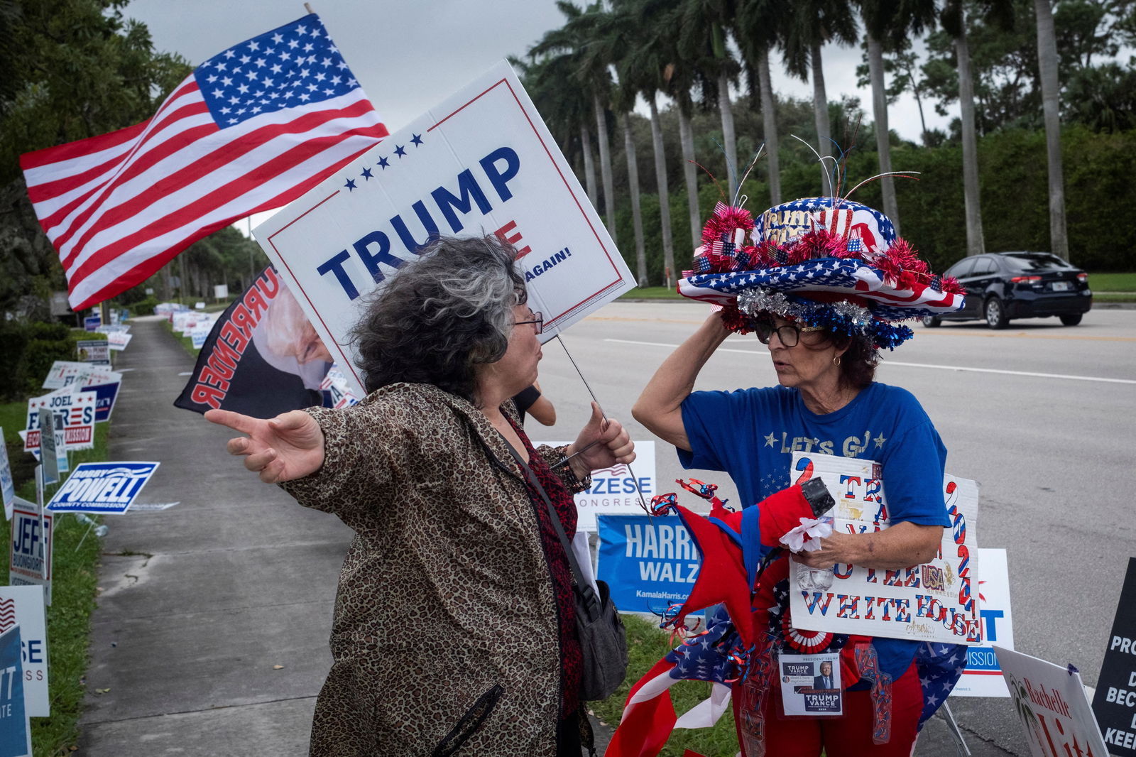 Supporters of Republican presidential nominee Donald Trump gather outside a polling station on Election Day in West Palm Beach, Florida, Nov. 5, 2024.
