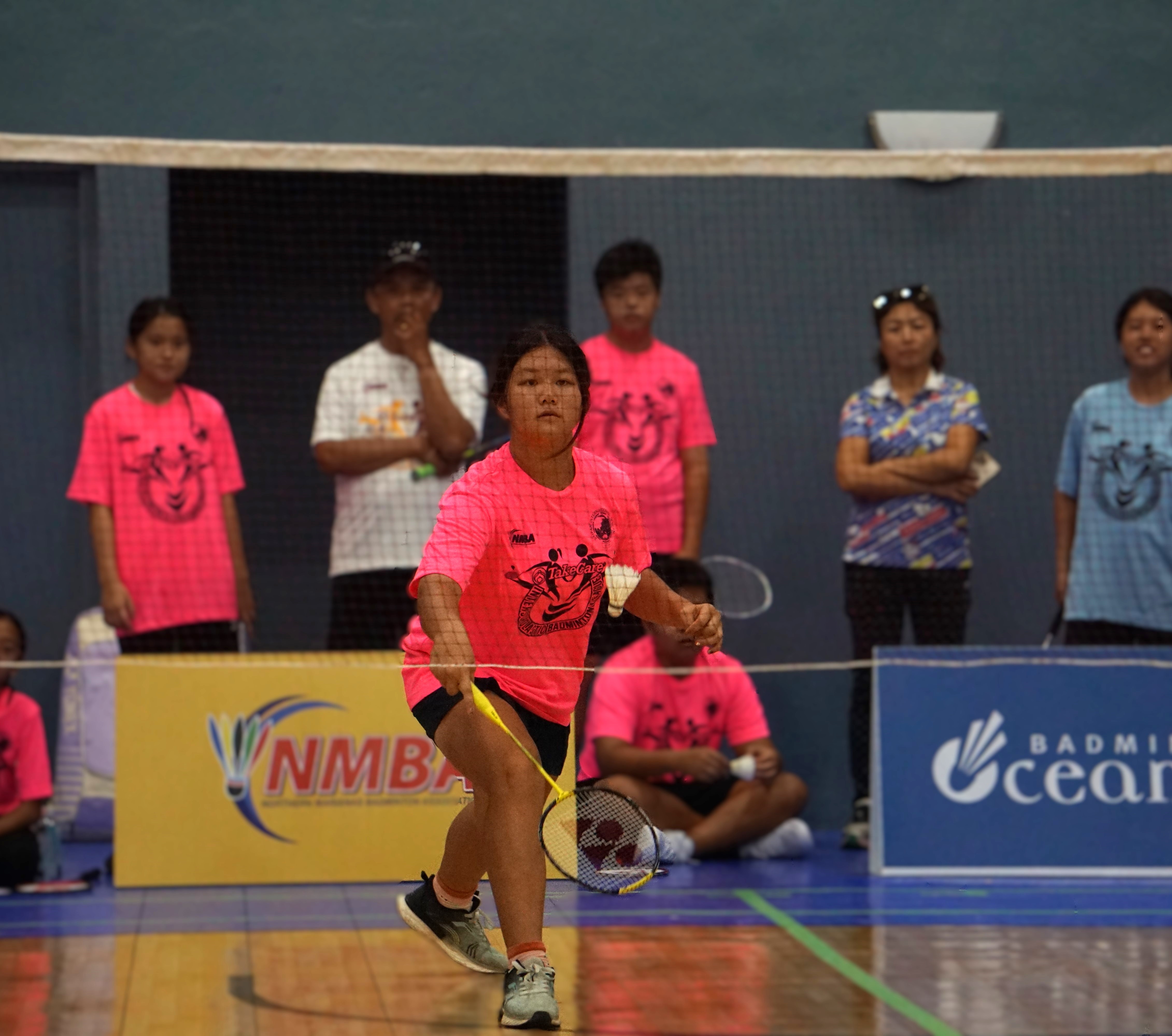 A Saipan International School player steps forward for the return during a girls singles event in the co-ed middle school division of the PSS-NMBA Interscholastic Badminton League SY24-25 at the Ada gym on Saturday.