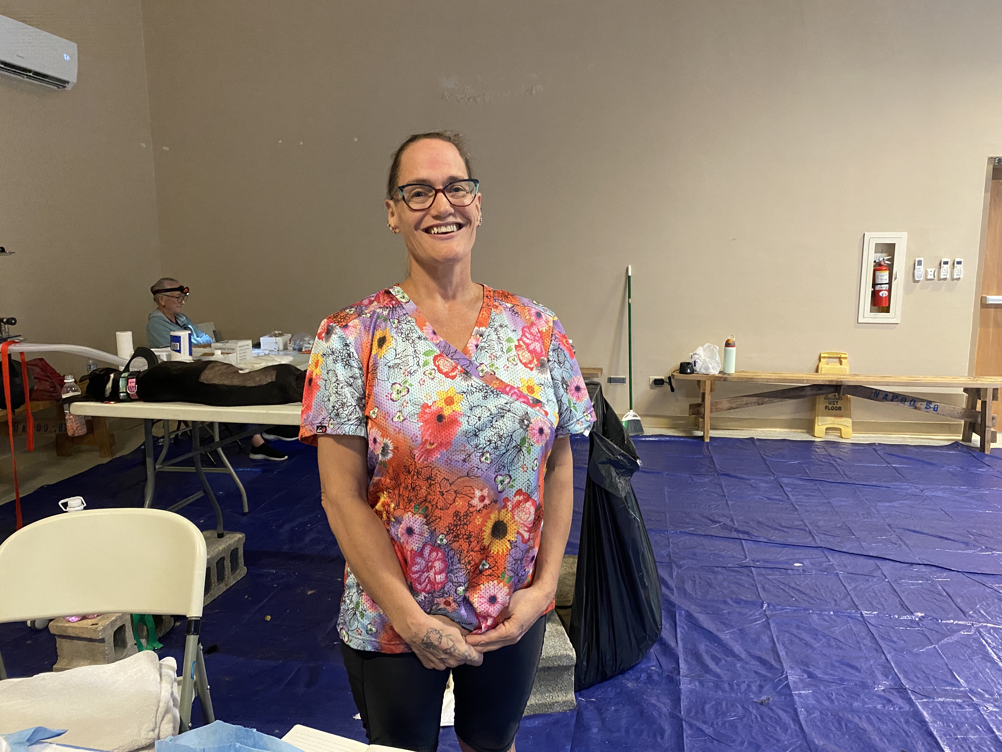 Visiting veterinarian Dr. Karter Neal poses for a photo after completing a successful pet surgery on Monday, Nov. 11.