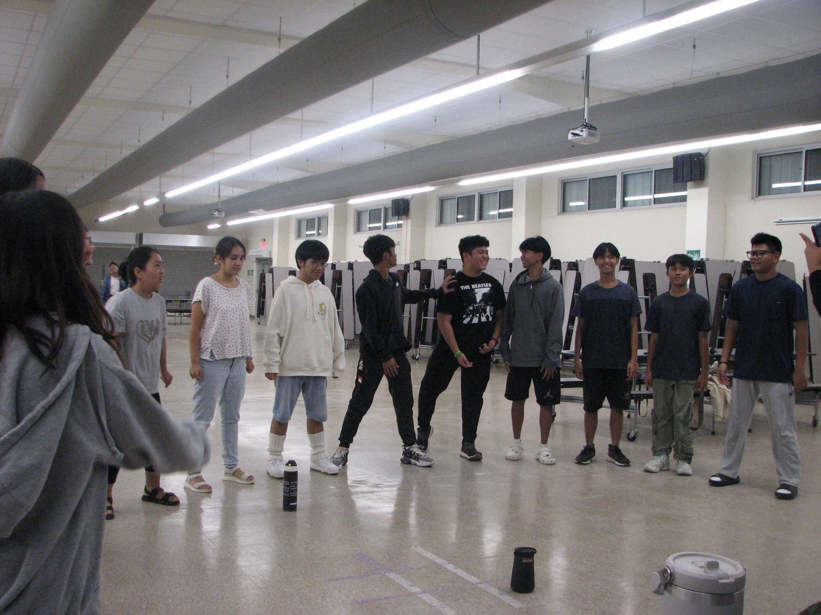  Rhythm ‘N Harmony singers practice for their upcoming “A Not-So-Silent-Night” glee concert.