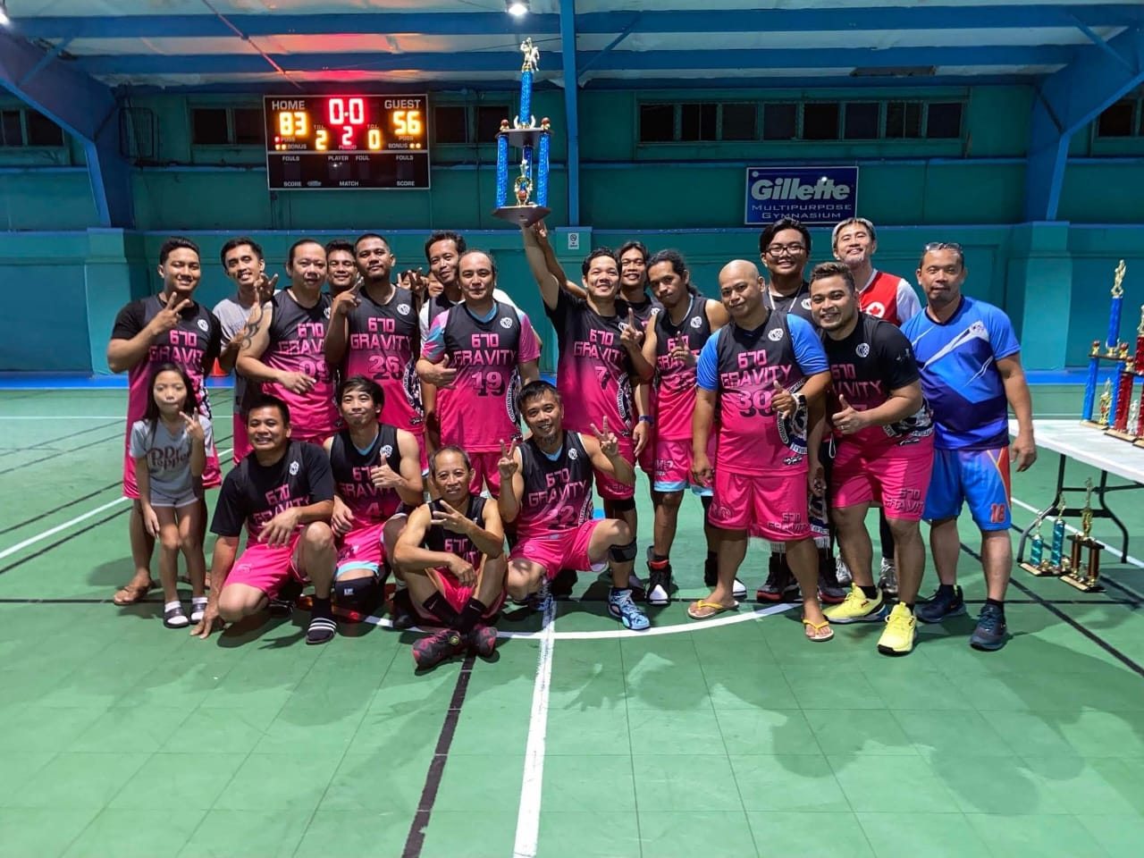 670 Gravity players pose with the masters division championship trophy of the Win Pacific Invitational Basketball League 2024 at the TSL Sports Complex on Sunday.