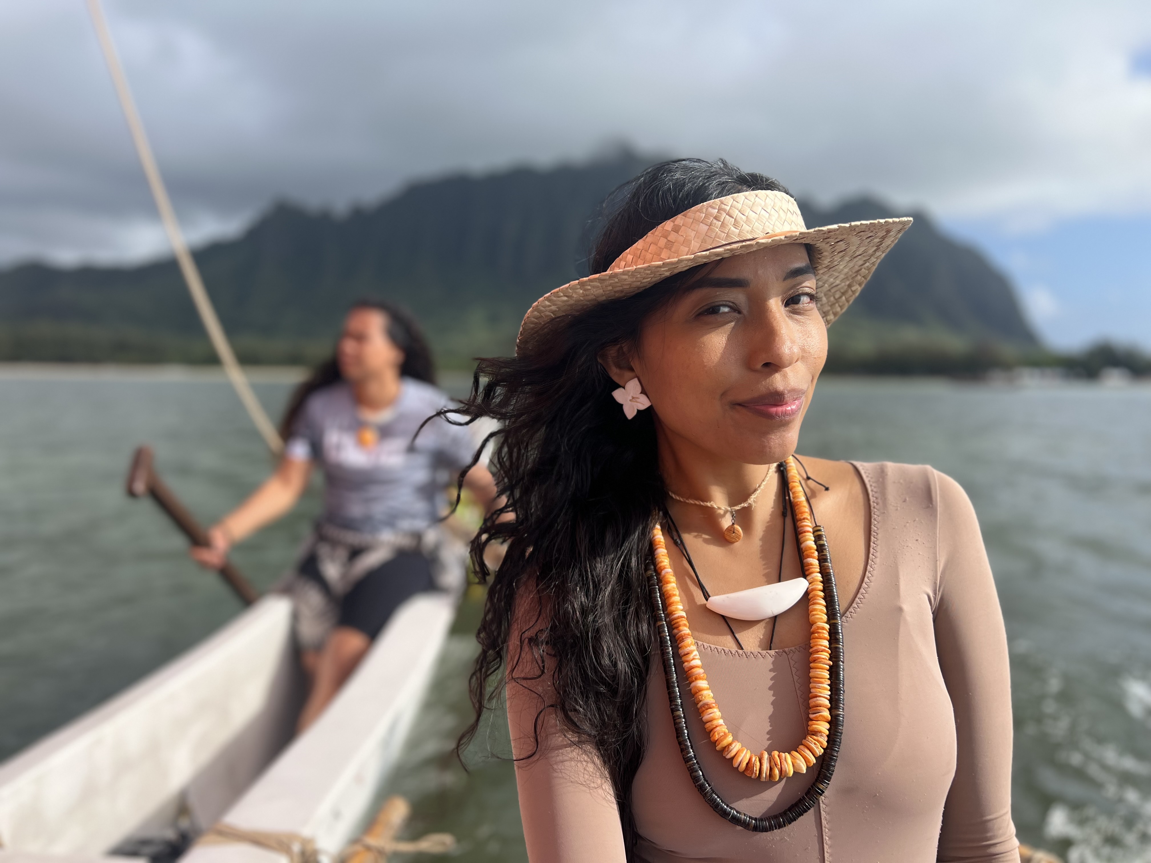 Eva Cruz, foreground, and April Repeki sail together during the festivities of the 13th Festival of Pacific Arts and Cultures. 