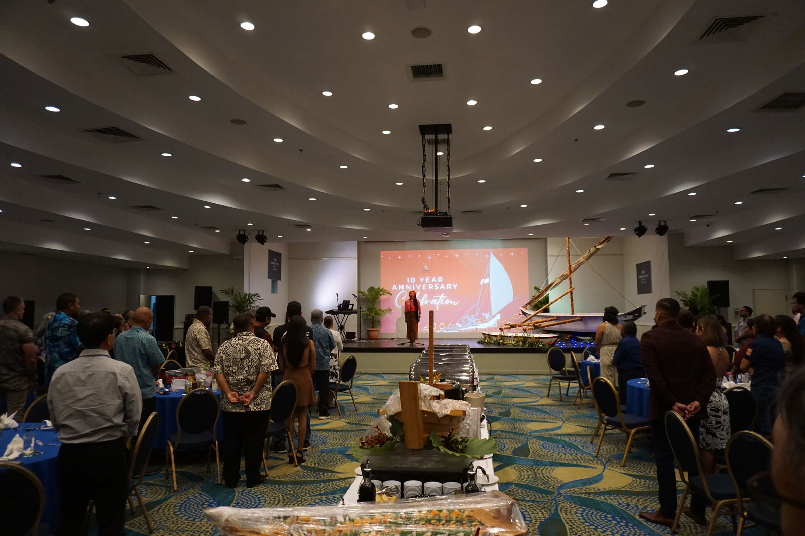 Frances Sablan opens the evening with a blessing chant.