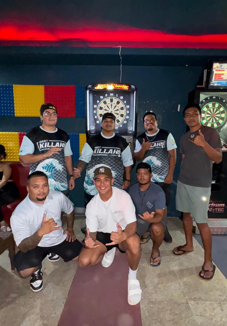 The Black 8 Dart Killahs pose for a group photo after completing the 2024 SEDA Bud Light Dart League regular season in the Thursday Flame Tree B division at the Black 8 Pool Bar.