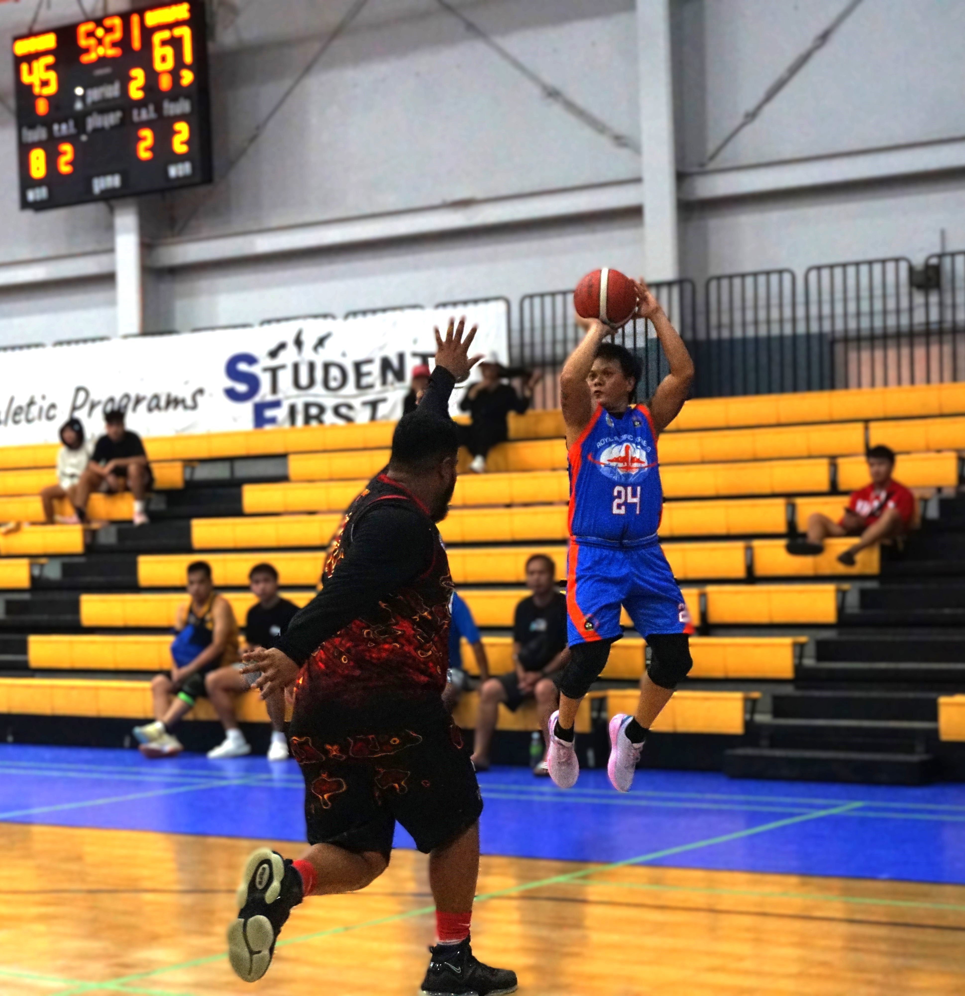 Royal Pacific/Islander Rent A Car’s Ronald Rueda pulls up for the three-point shot during an open division game of the 2nd SMEC-SMLEG Basketball Tournament at the Ada gym on Sunday.  