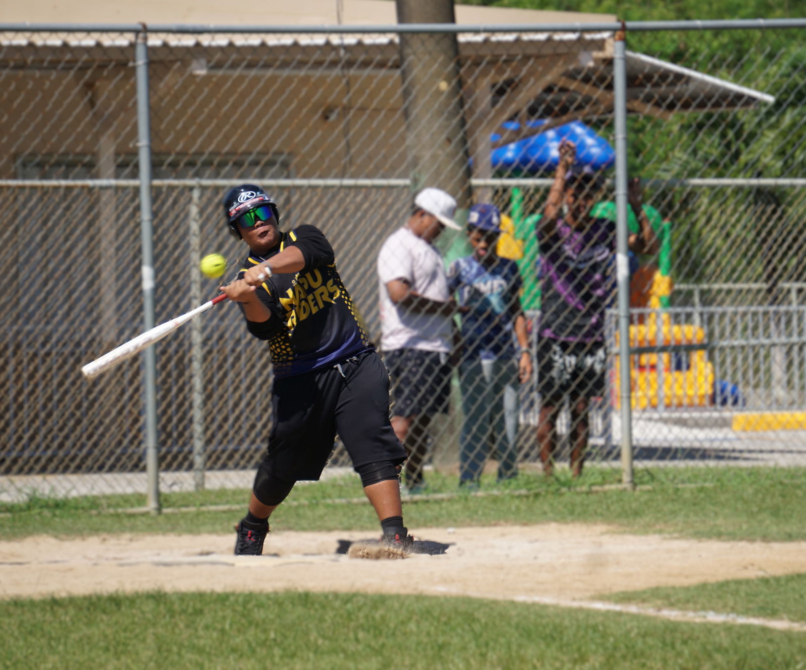 Francisco M. Sablan Middle School's James Ngotel (not Gavin Rogolifoi as earlier stated) connects a single during a game against Mount Carmel School in the boys middle school division of the PSS-SBL Interscholastic Fastpitch Softball League SY24-25 at the Dandan softball field on Saturday.