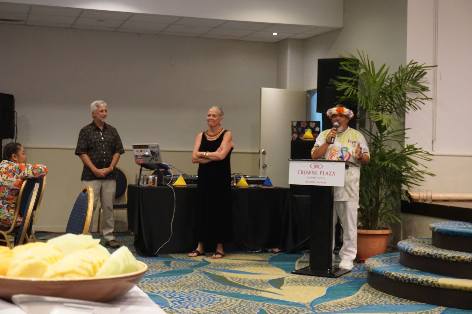 From left, Peter and Emma Perez, the 500 Sails cofounders, listen as emcee Gordon Marciano speaks about the organization, which is celebrating its 10th anniversary.