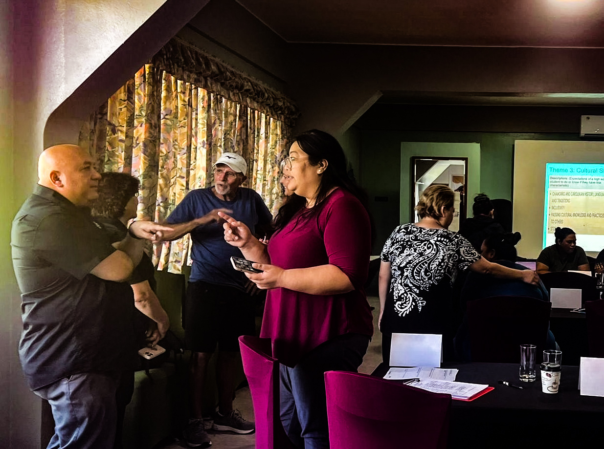 Commissioner of Education Dr. Lawrence F. Camacho, left, listens to Rota Mayor Aubry Hocog during a Portrait of a Learner/Portrait of a Graduate outreach and training session on Rota on Tuesday.