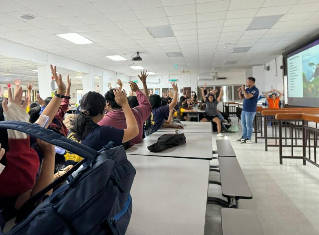 Students at Hopwood Middle School respond during a presentation about The Marianas tourism industry on Nov. 6, 2024, by Marianas Visitors Authority Community Projects Coordinator Jack Aranda, right. Aranda and representatives of the Marianas Tourism Education Council presented at the school in Chalan Piao, Saipan.