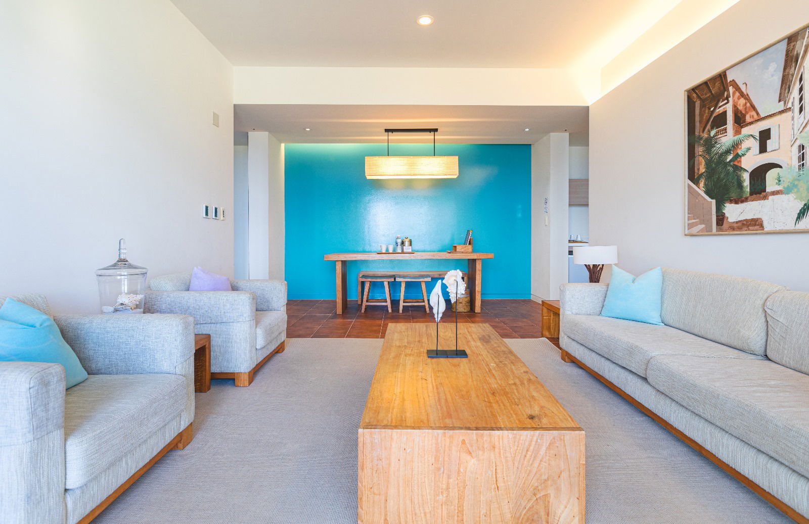 In the Suite, the spacious living room serves as its centerpiece with separate bedrooms and bathrooms to ensure privacy.