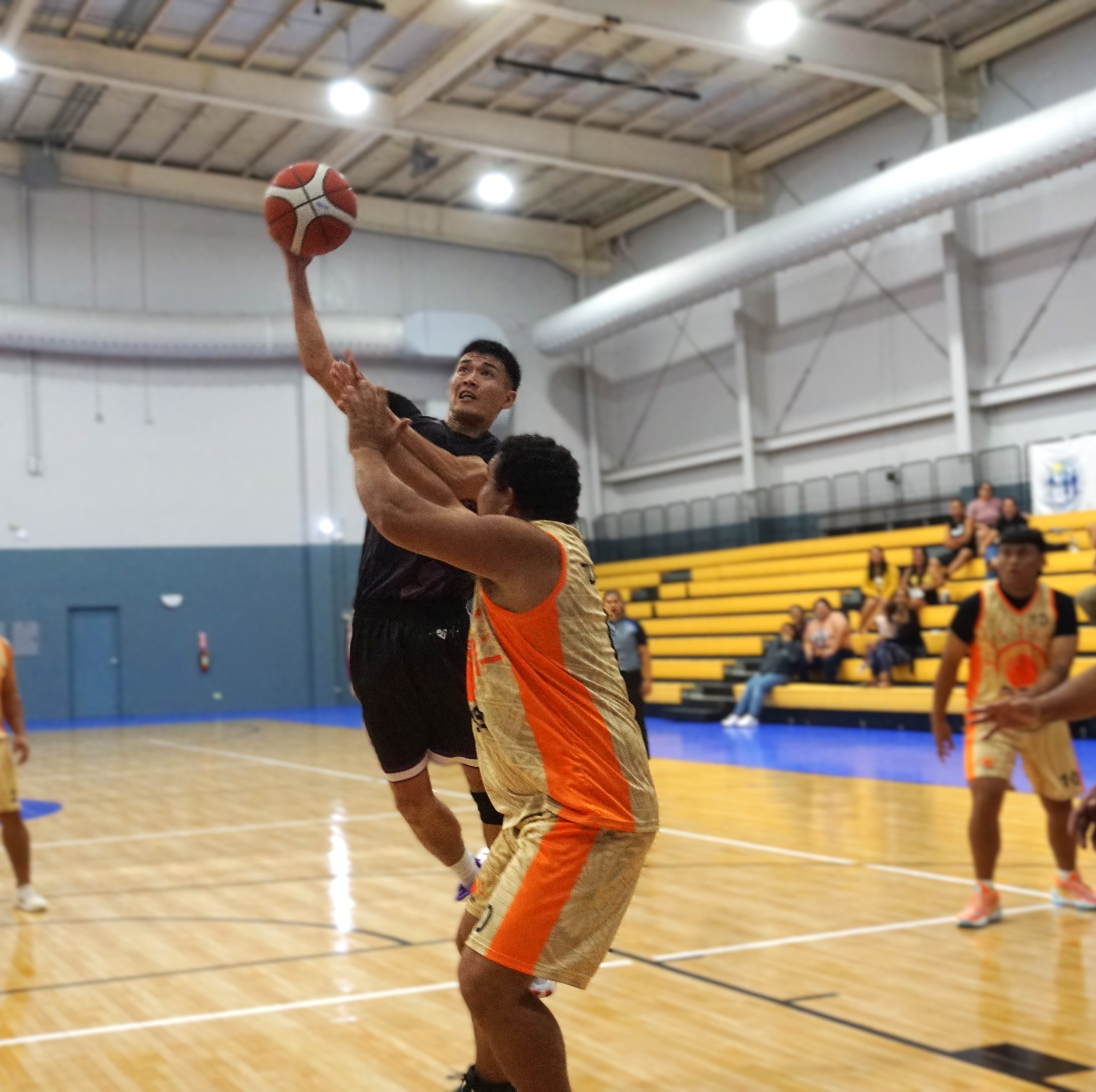 Priority Care’s Justice Aldan extends for a hook shot over a defender during a game of the 2024 R&J Wine and Liquor Inter-Government/Business League at the Ada gym. 