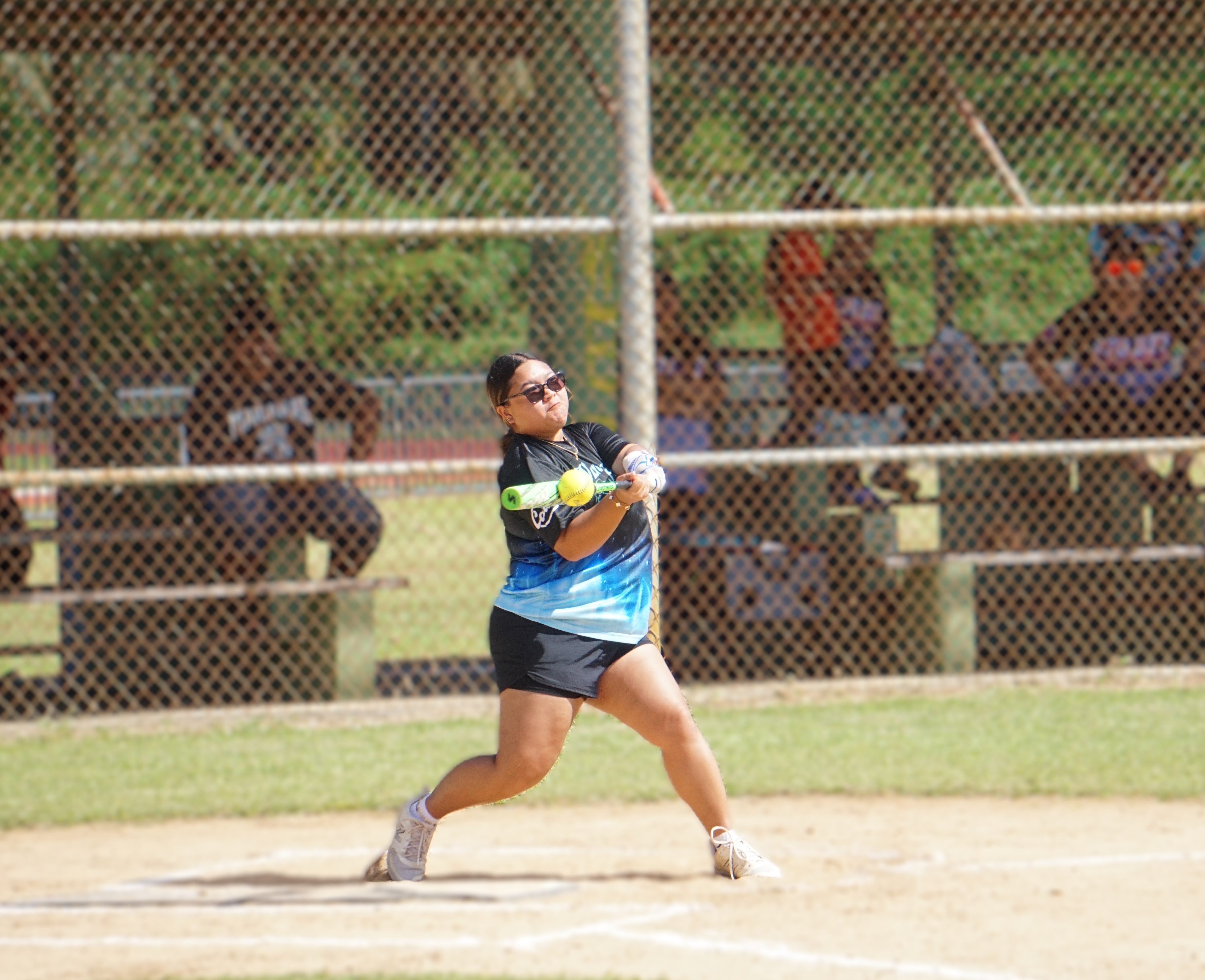 Man Amigas’ Alana Sablan connects a single during a game against the 670 Babes for Fun in the inaugural NMI Softball Association Women’s League at the Miguel "Tan Ge" Pangelinan softball field on Saturday.