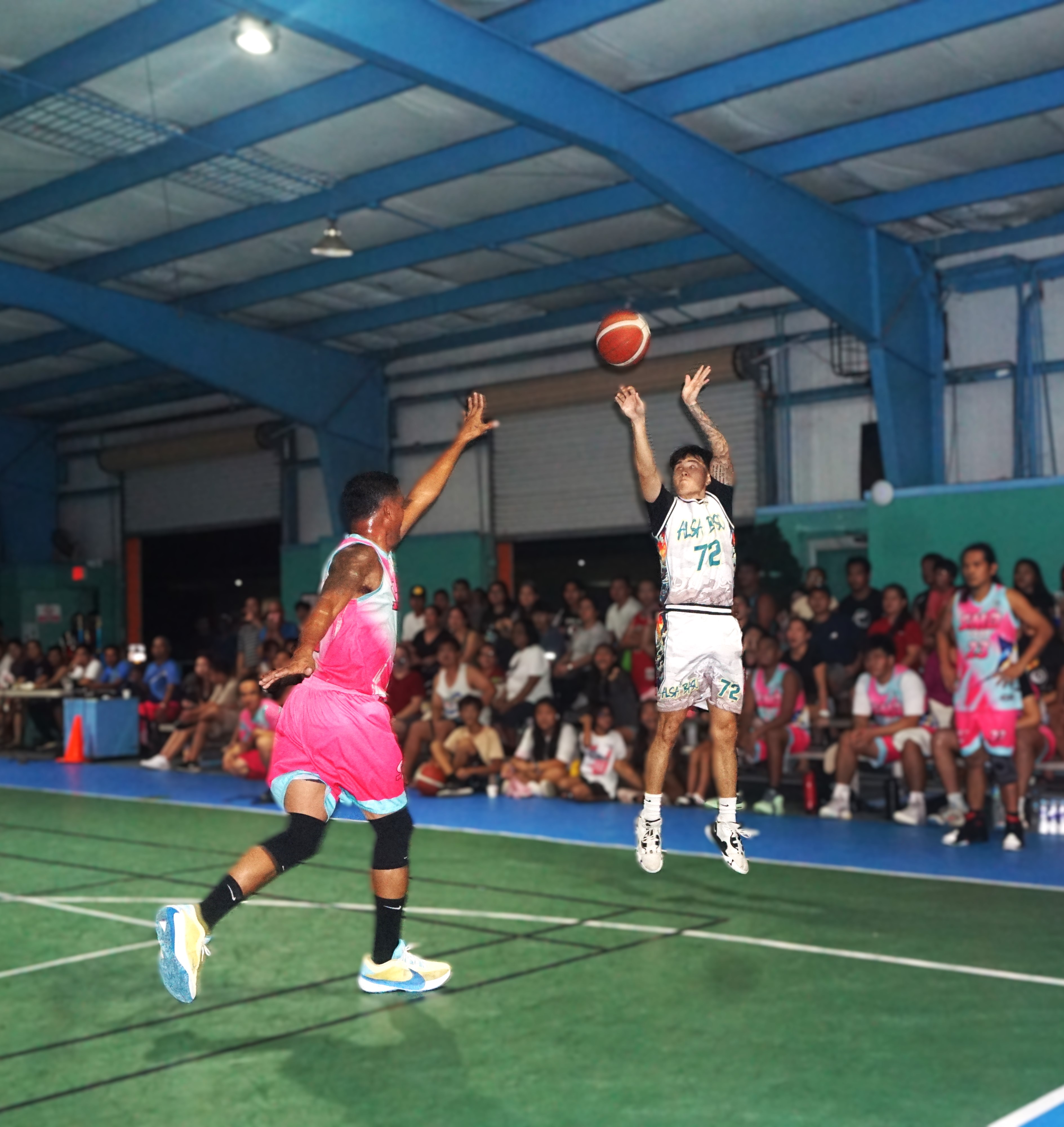 Alsa Baso's Tony Kim pulls up for a three-point shot during the championship game against SMJ Corp. in the semi open division of the Win Pacific Corporation Invitational Basketball League 2024 at the TSL Sports Complex on Sunday.