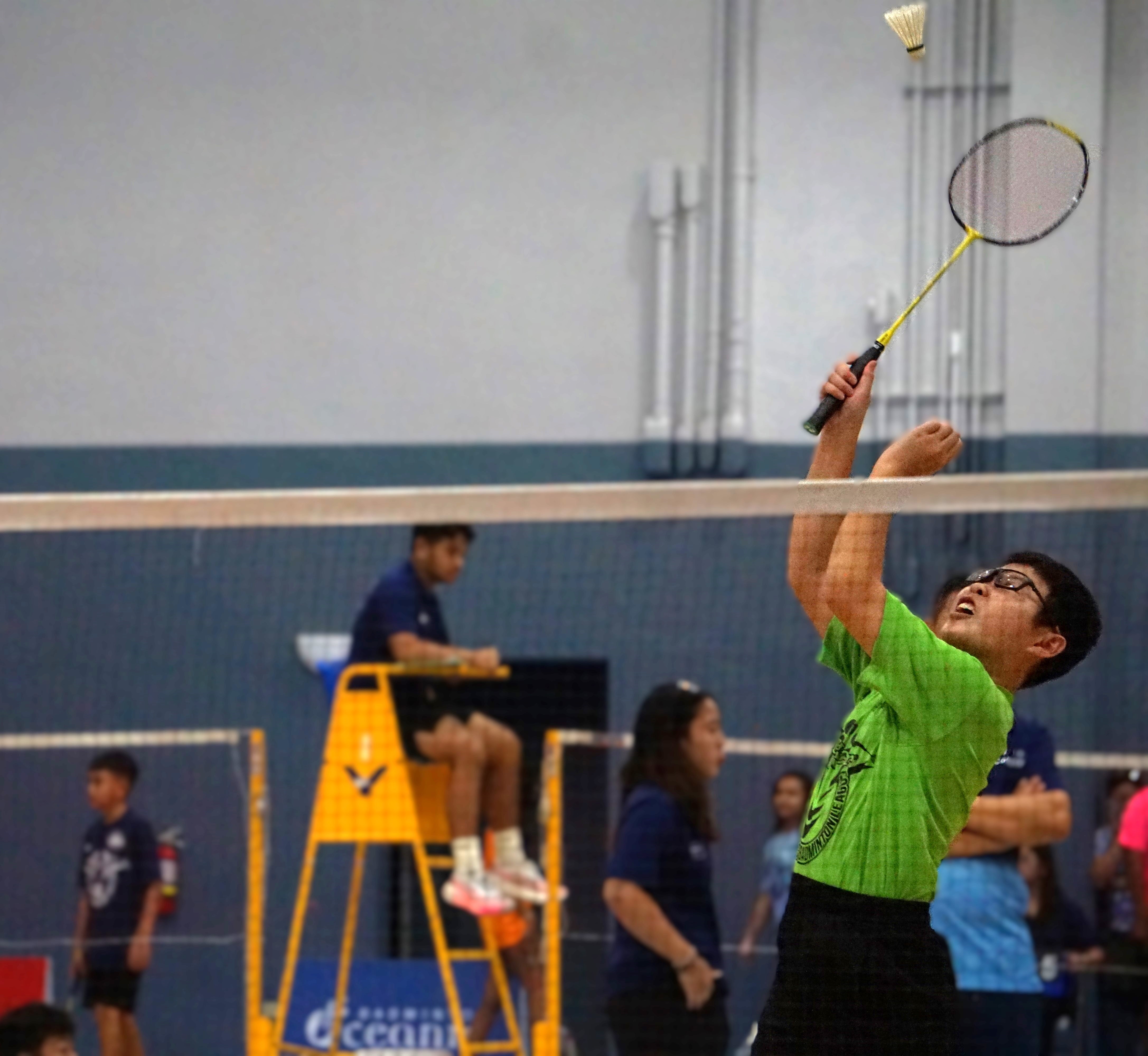 An Agape Christian School 2 player rises up for the smash return during a boys singles event in the co-ed middle school division of the PSS-NMBA Interscholastic Badminton League SY24-25 at the Ada gym.