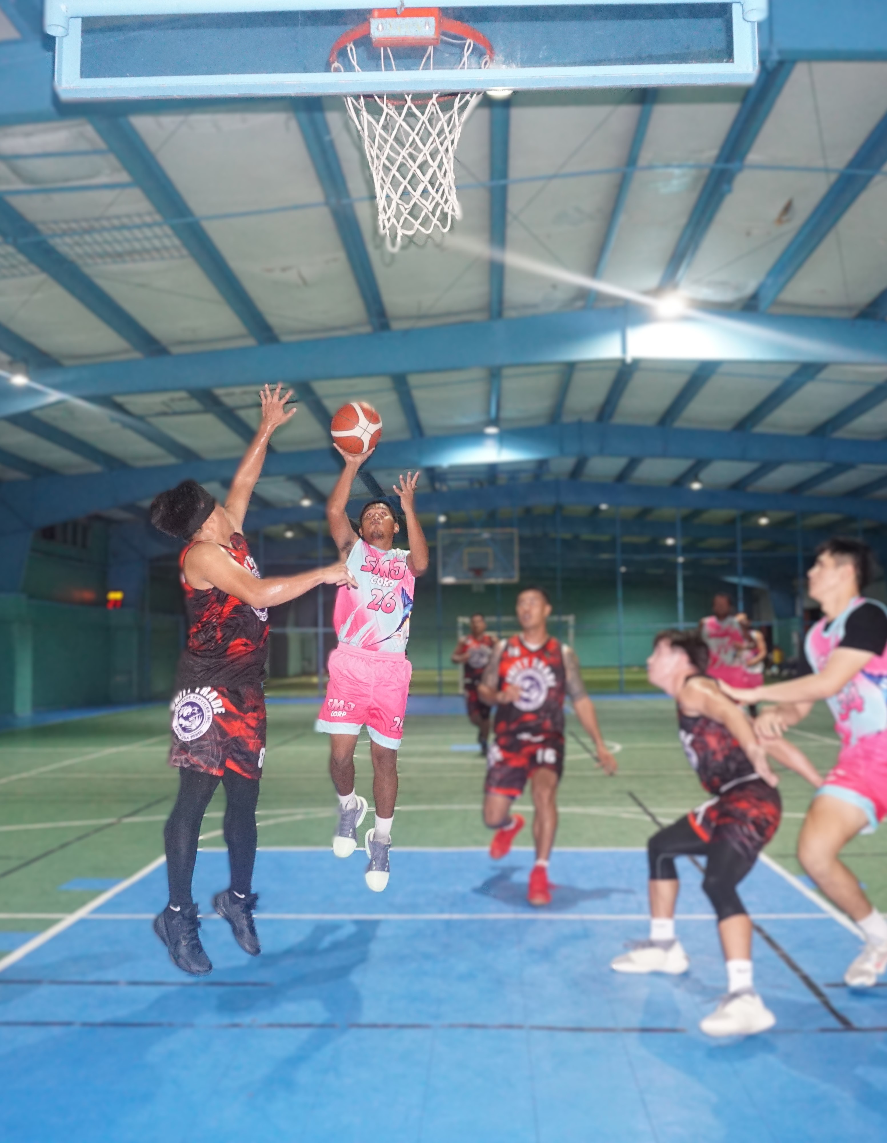 SMJ Corp’s Jerome Directo rises up for the floater during a playoff game against Unity Trade in the semi open division of the Win Pacific Corporation Invitational Basketball League 2024 at the TSL Sports Complex on Saturday.