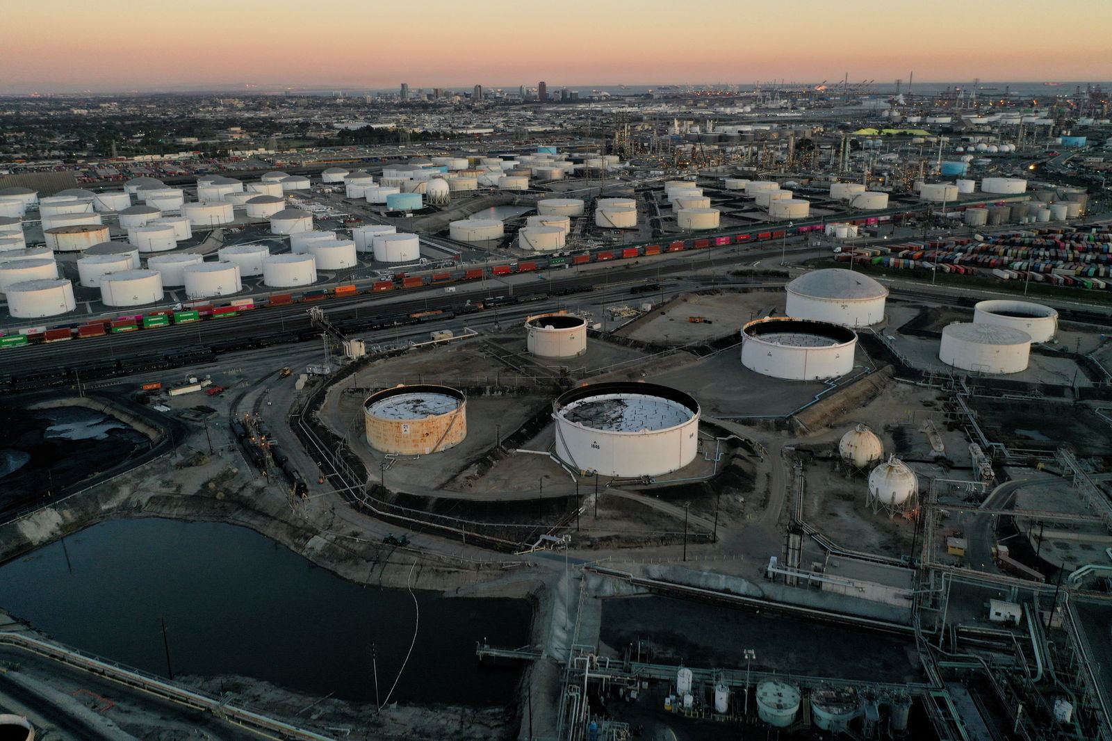 Storage tanks for crude oil, gasoline, diesel, and other refined petroleum products are seen at the Kinder Morgan Terminal, viewed from the Phillips 66 Company's Los Angeles Refinery in Carson, California, March 11, 2022.