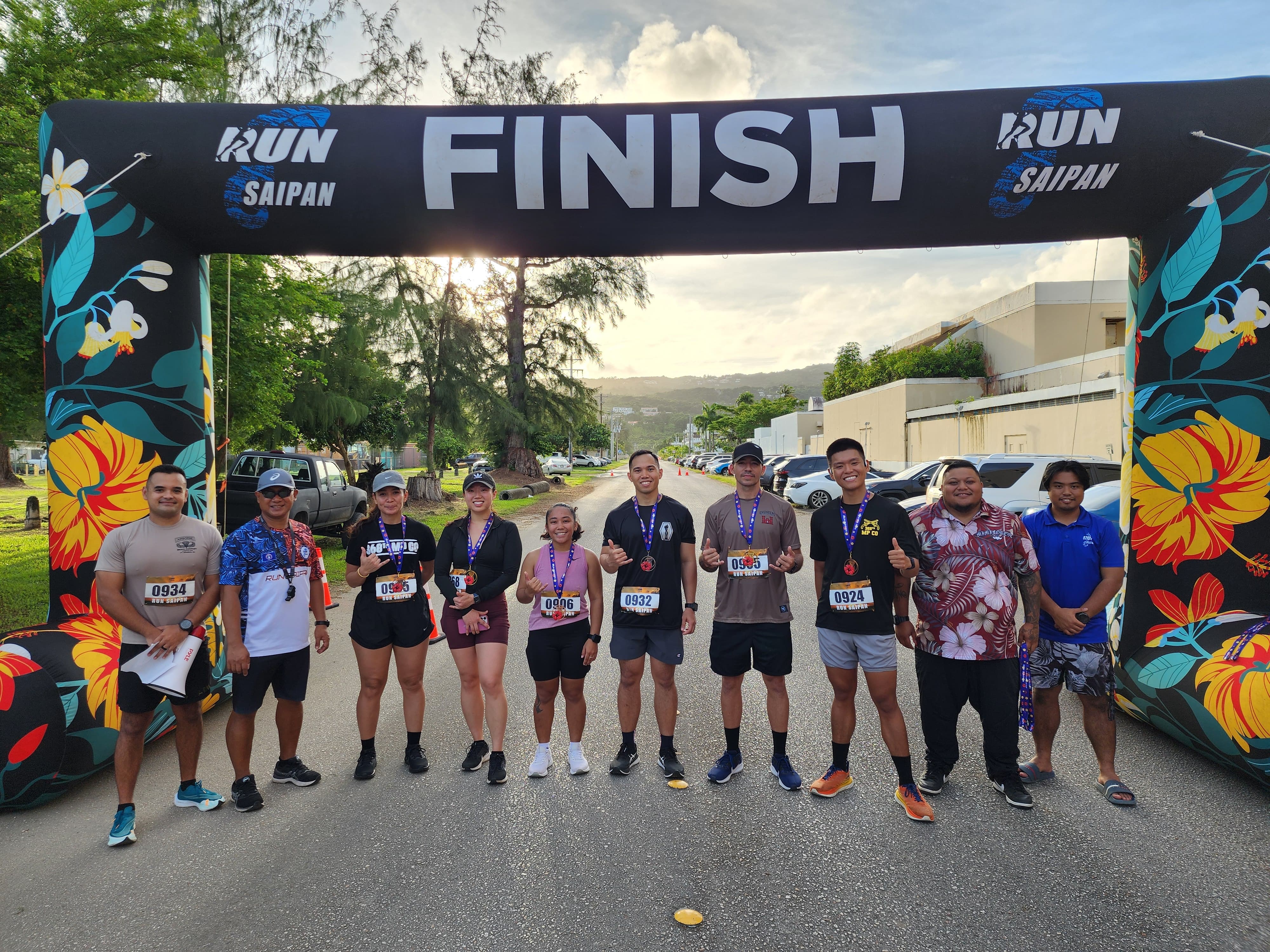 The top three winners of the armed forces category pose for a photo during the awards ceremony of Run Saipan’s Veterans Day 5K 2024 at Micro Beach Monday morning.
