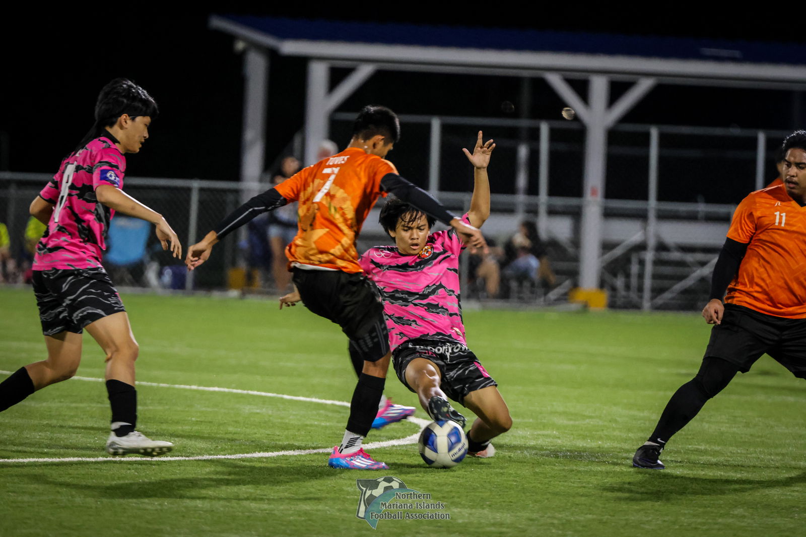 Matansa’s Anthony Austria slides in an attempt to intercept the possession against Kanoa during the title match of the Marianas Soccer League 1 Fall 2024 at the NMI Soccer Training Center on Sunday. 