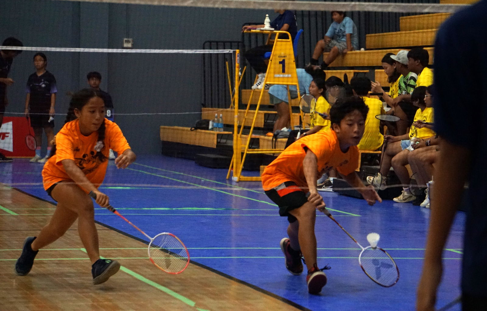 Francisco M. Sablan Middle School players reach out to save the possession during a mixed doubles game in the co-ed middle school division of the PSS-NMBA Interscholastic Badminton League SY24-25 at the Ada gym on Saturday. 
