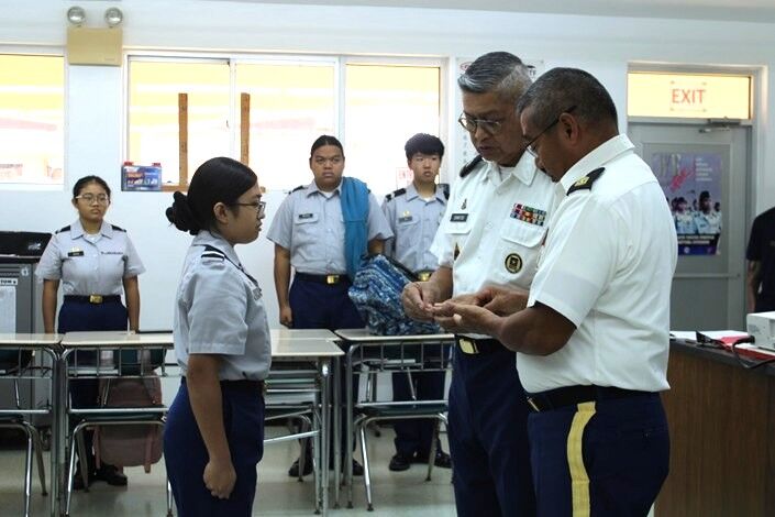 Stephanie Diaz received ribbons for perfect attendance, academic excellence, personal appearance, n-3-12, n-3-15, n-1-7, n-1-9, and an NHS cord.