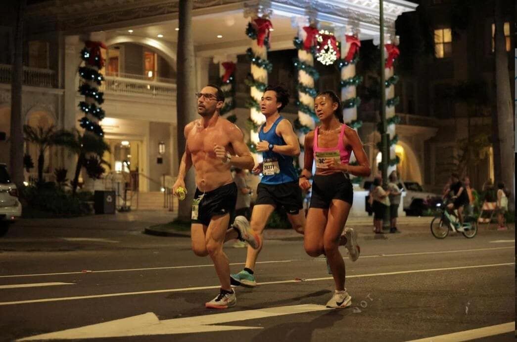 Tania Tan makes her way through the course during the Start to Park 10K race of the 2024 Honolulu Marathon in Honolulu, Hawaii on Sunday, Dec. 8.