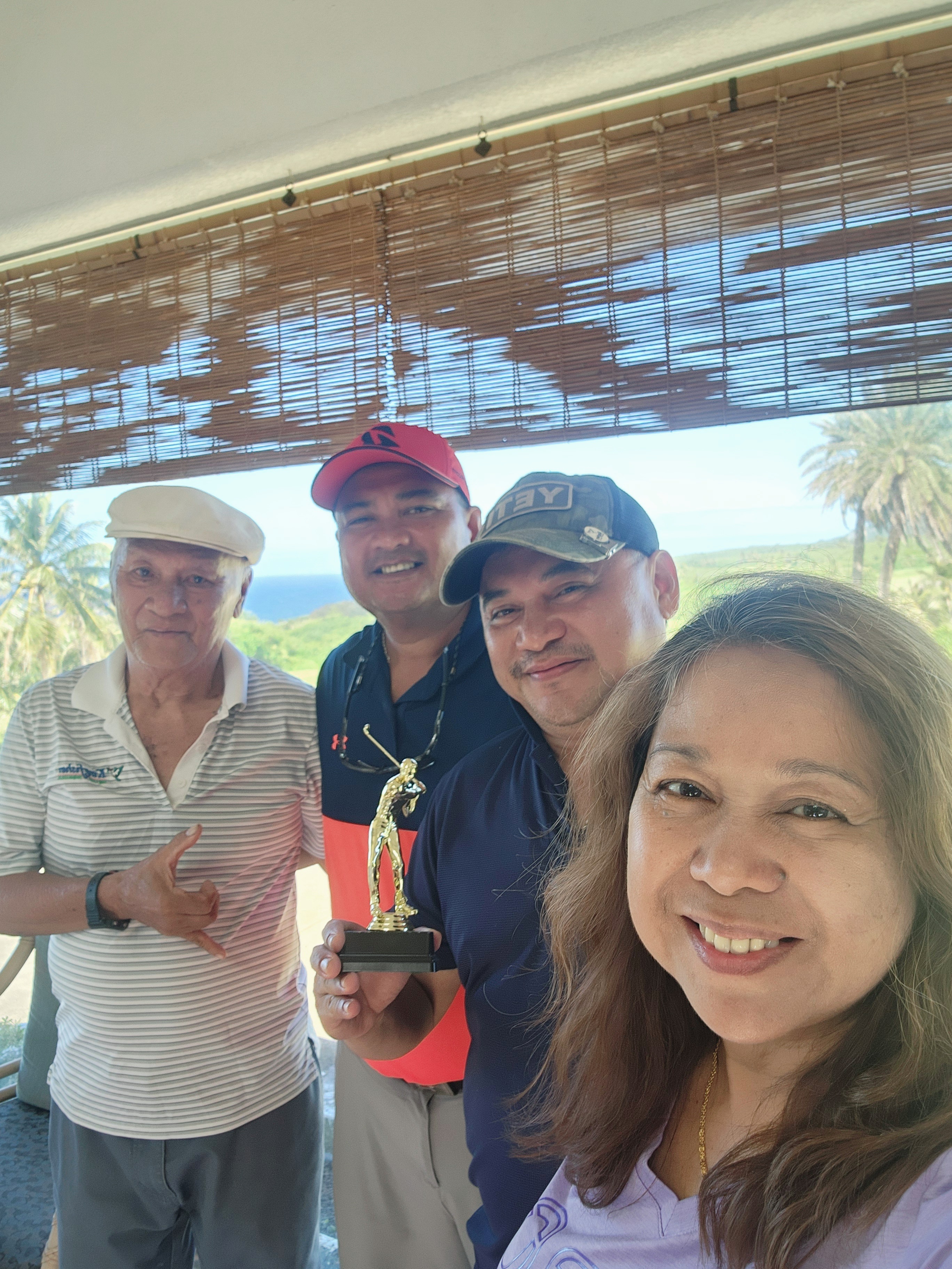 Eddie Terlage tops the Pin Seekers Golf Association’s November Ace Tournament, which was held at their home course, Kingfisher Golf Links, on Dec. 8, 2024.  Eddie was awarded with a trophy, cash prize and a golf certificate.  With him in this photo are Manny Tenorio and Alfred Aldan, the September and October ace tournament winners, respectively, along with Kingfisher's assistant manager Jo Camacho.  The December ace tournament will be held at Kingfisher Golf Links on Dec. 29, 2024.
