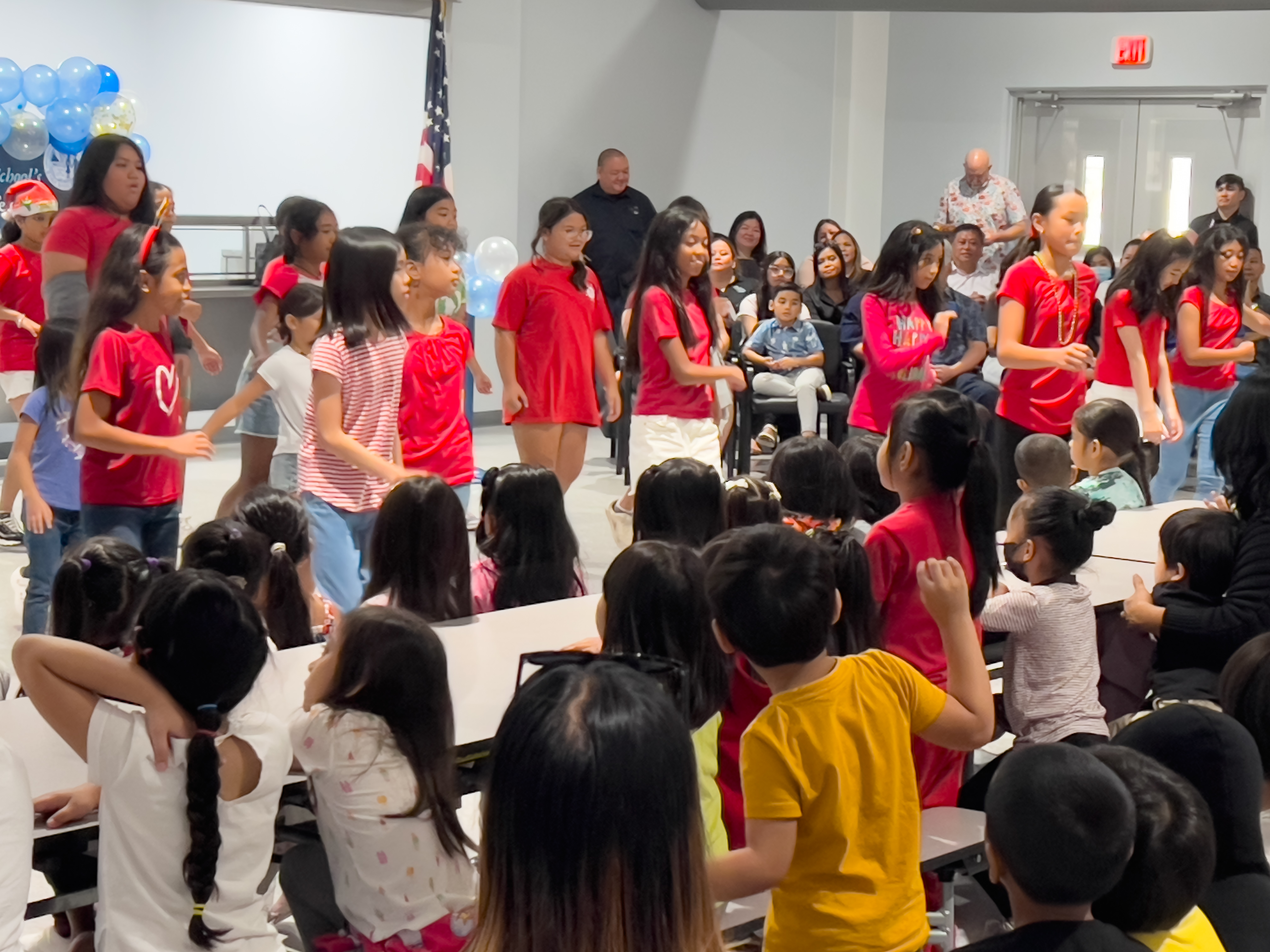 Garapan Elementary School students perform a special dance number in their newly constructed cafeteria.