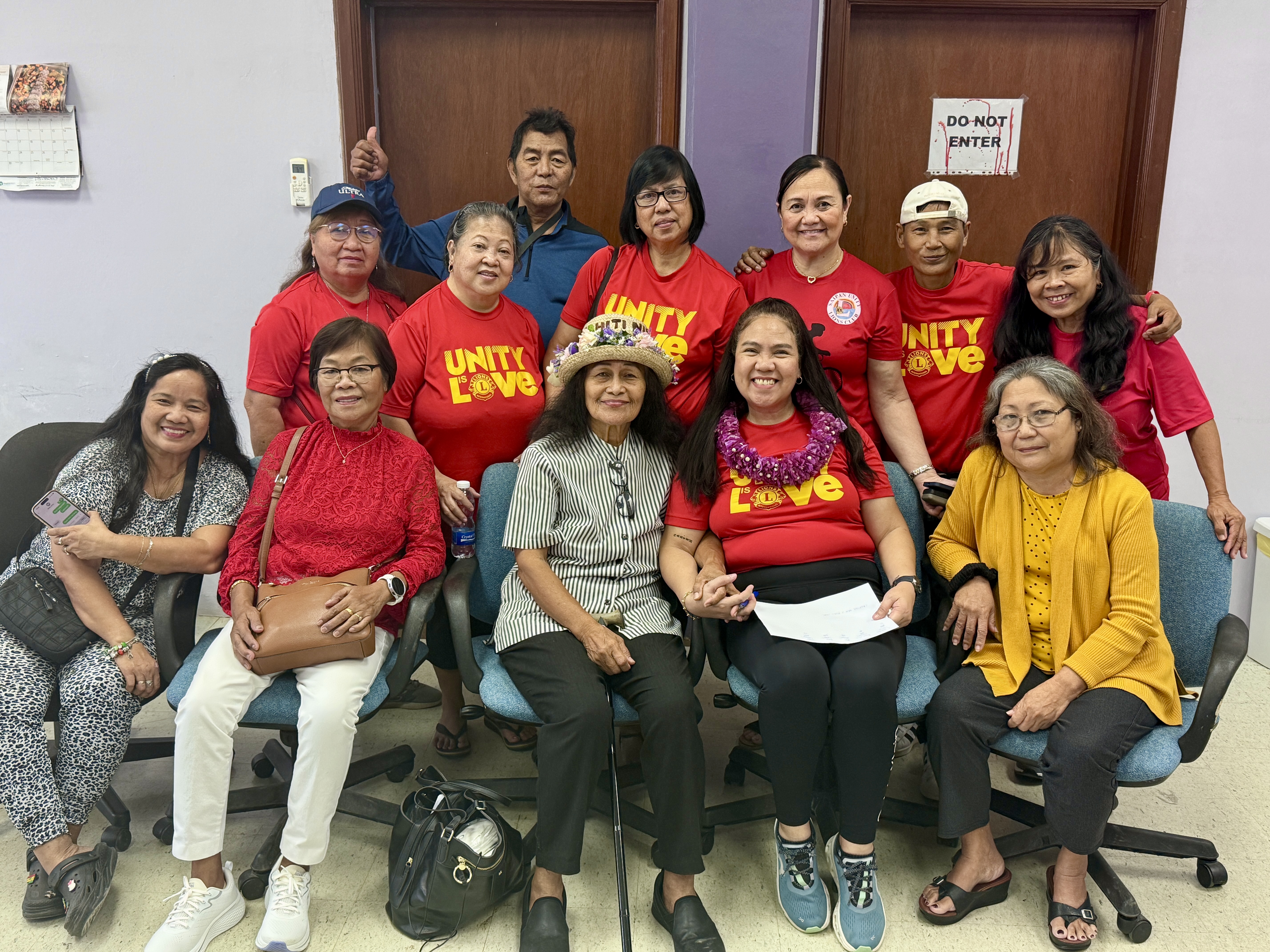 Saipan Unity Lions Club members with some of the senior citizens at the manamko’ center.