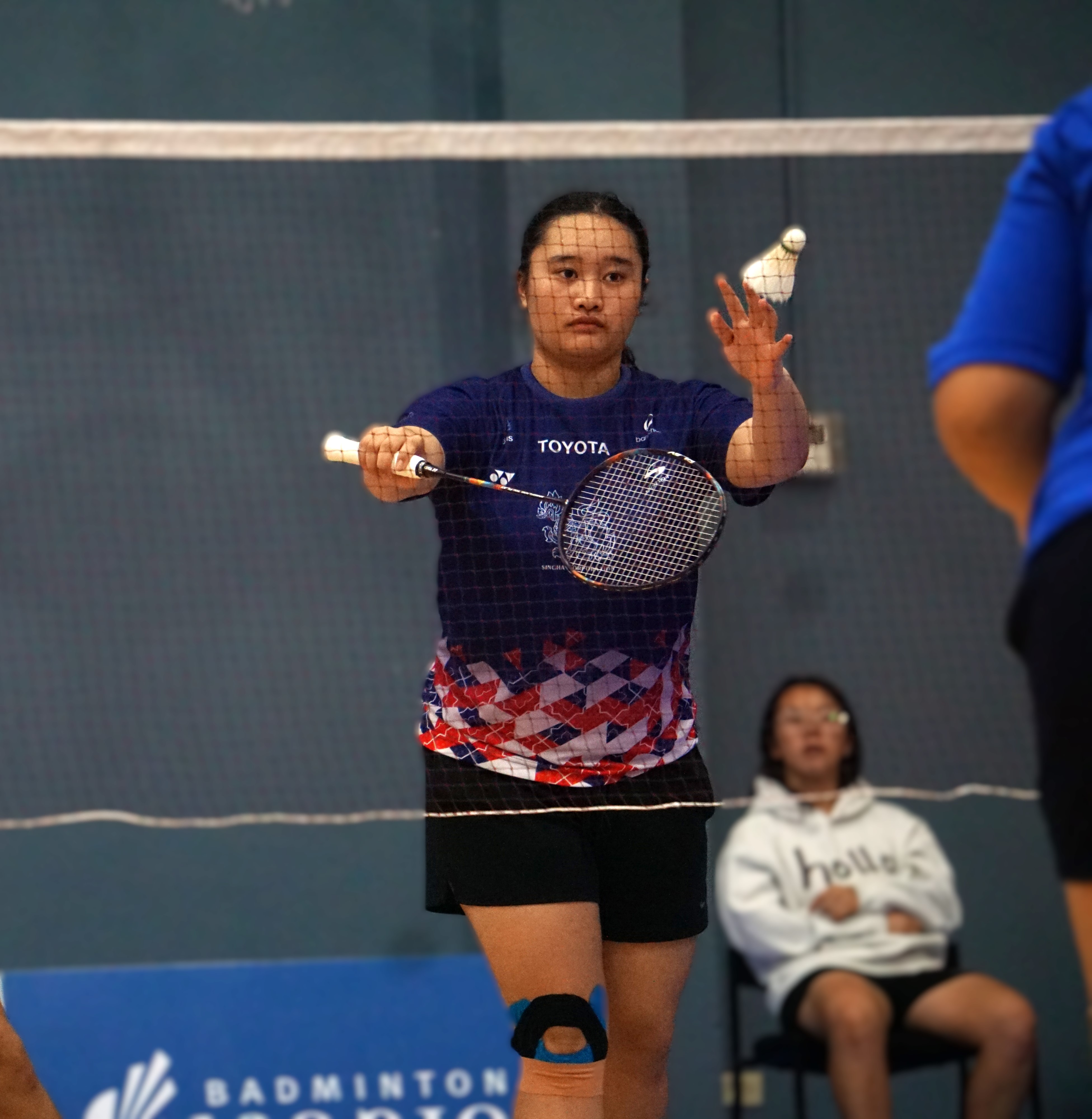 Shaina Malonzo attempts a serve during a U17 girl's singles match of the NMI Badminton National Championships 2024 at the Ada gym on Saturday. 