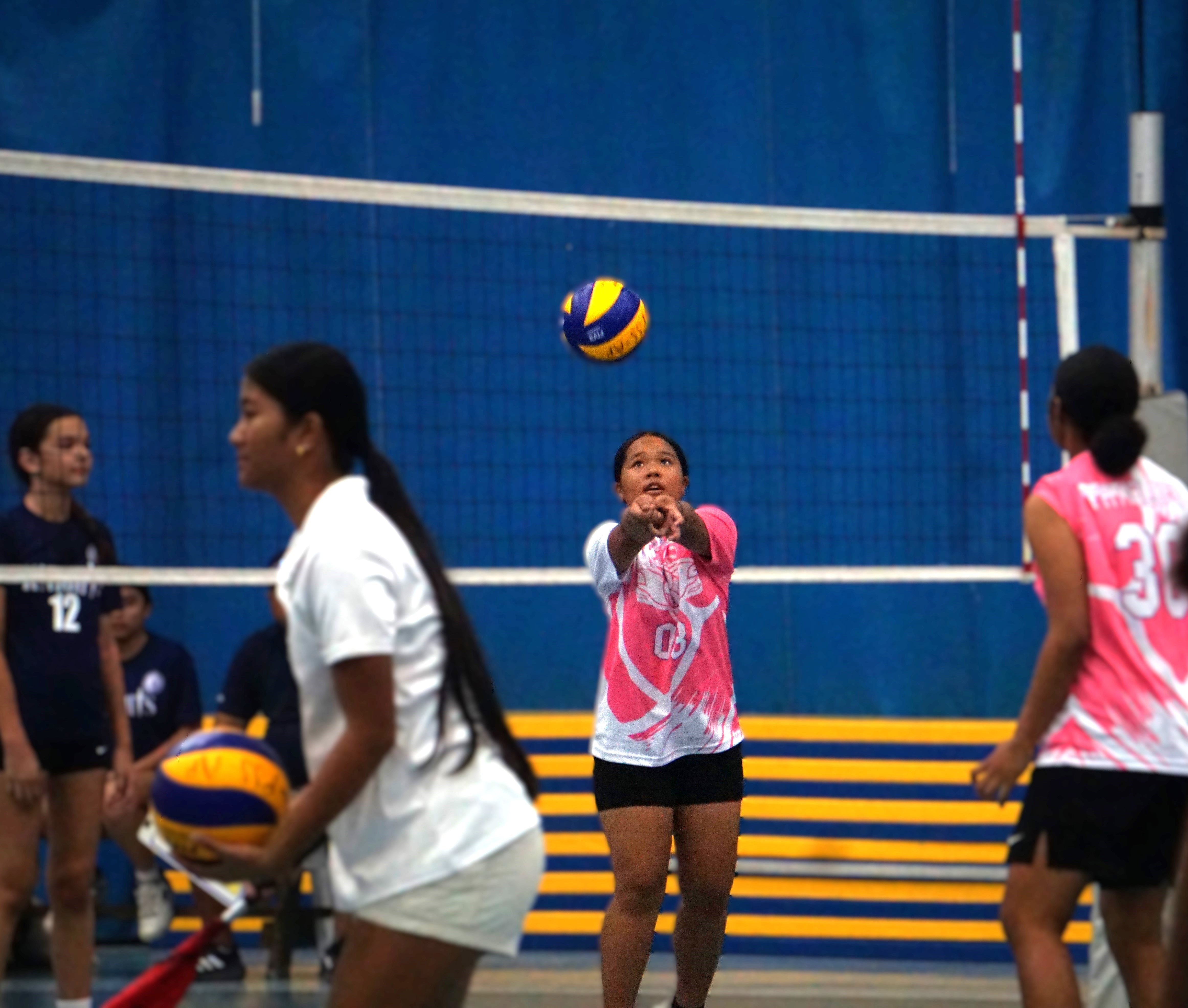 Tanapag Middle School's Miku Sharry connects the bump return against Mount Carmel School during a game in the girls middle school division of the PSS-NMIVA Interscholastic Volleyball League SY24-25 at the Marianas High School gym.