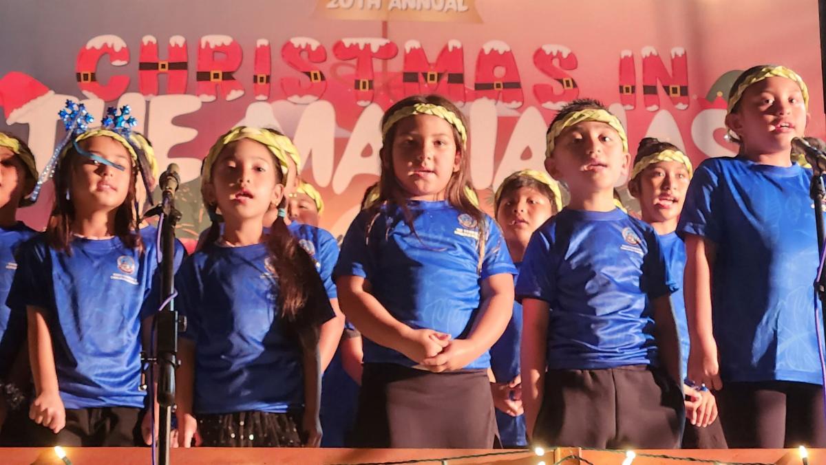 Students sing Christmas carols at the 20th Annual Christmas in The Marianas on Dec. 7, 2024, in Garapan, Saipan. The annual signature event of the Marianas Visitors Authority featuring school children performances will return on the evening of Dec. 14.