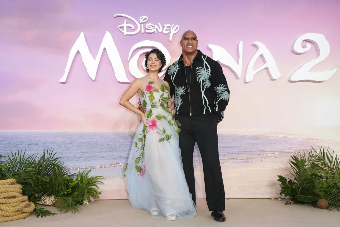 Auli’i Cravalho and Dwayne Johnson pose for photographers upon arrival at the U.K. Premiere of “Moana 2” on Sunday, Nov. 24, 2024 at a central London cinema.