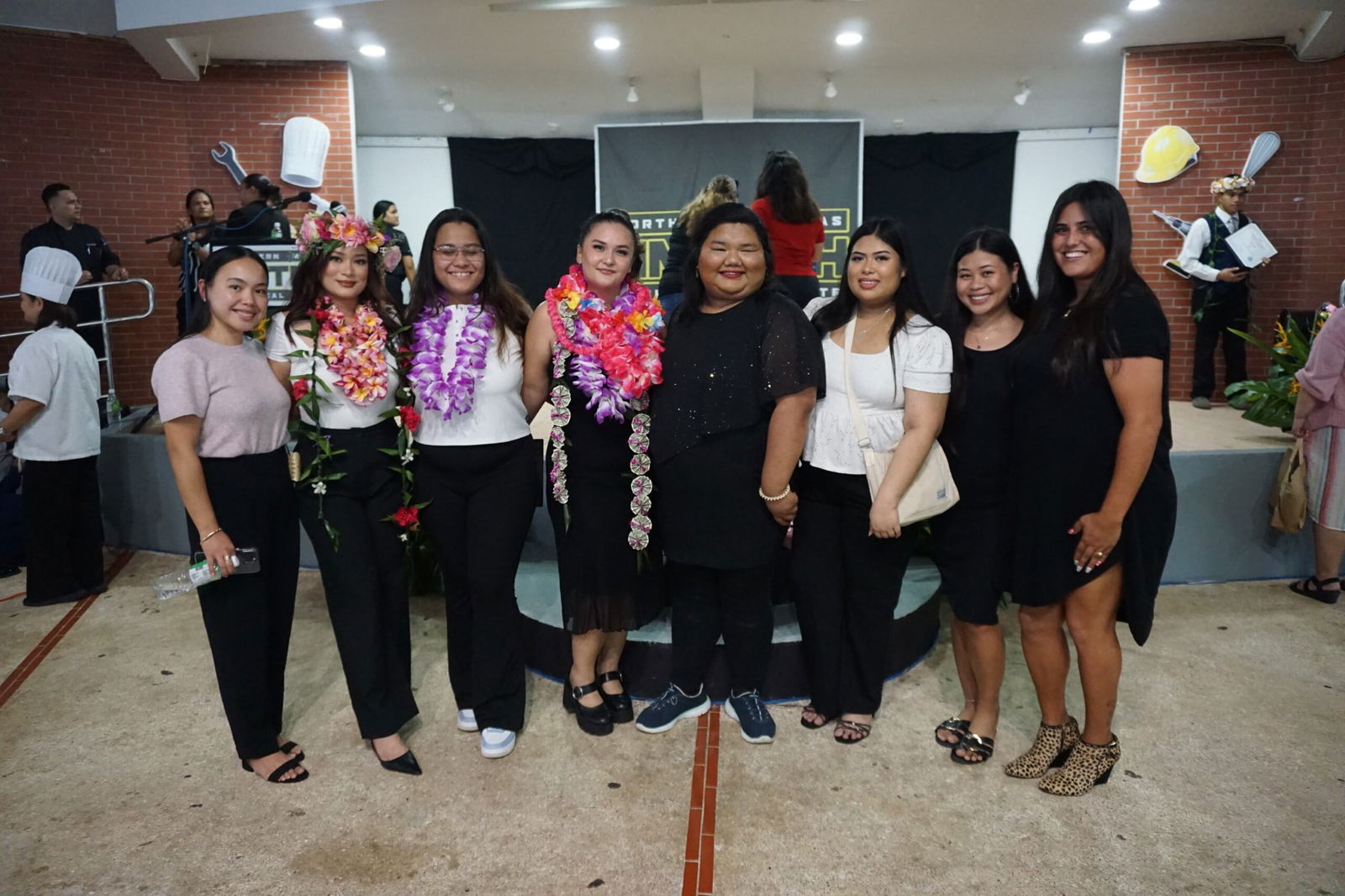 NMTech cosmetology students pose for a group photo. Anna Palacios is fourth from left.