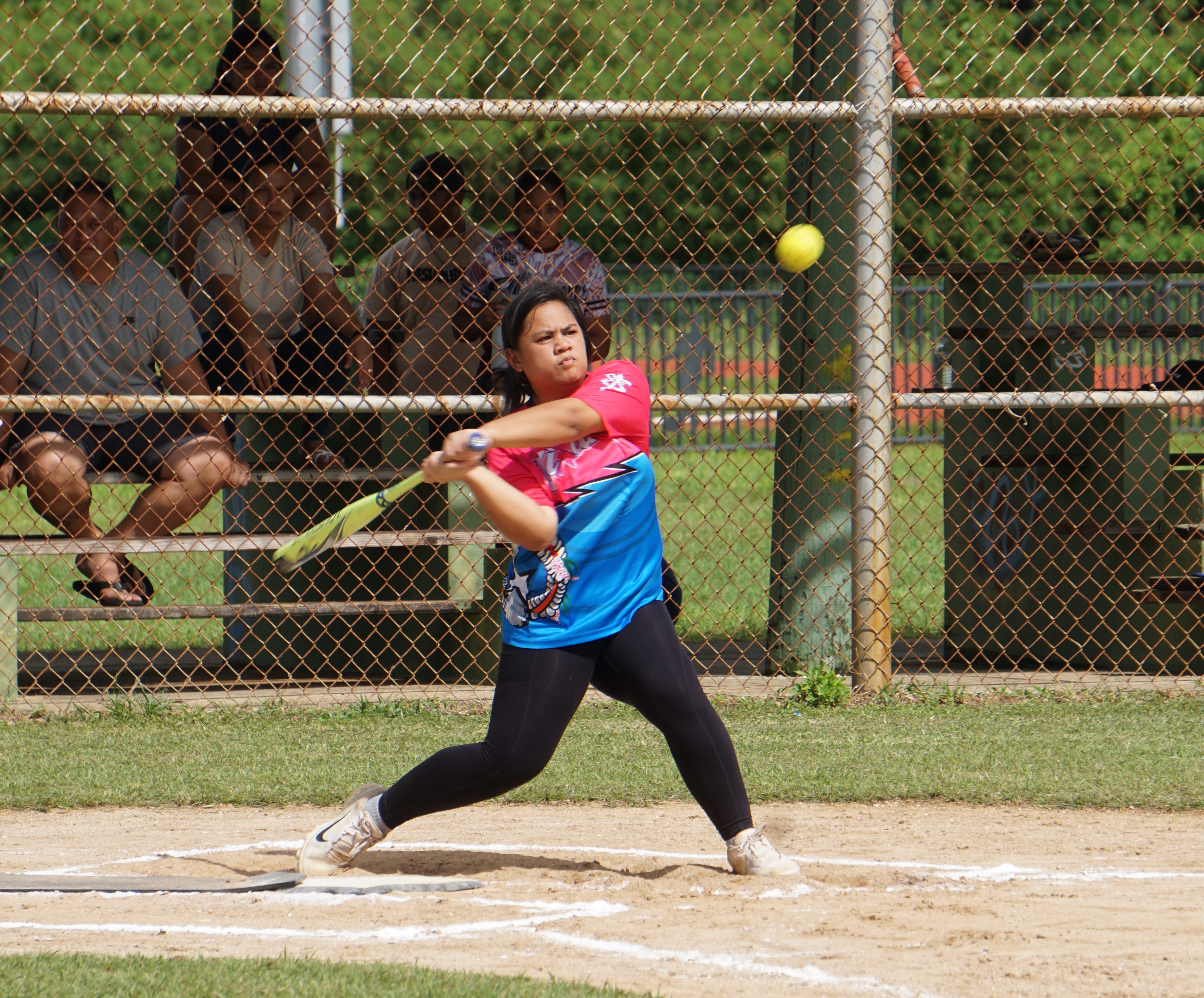 Wettz's Ashley Aguon swings and connects a single during a game against the Dirty Diamonds in the NMI Softball Association Women’s League at the Miguel "Tan Ge" Pangelinan Softball Field on Saturday.