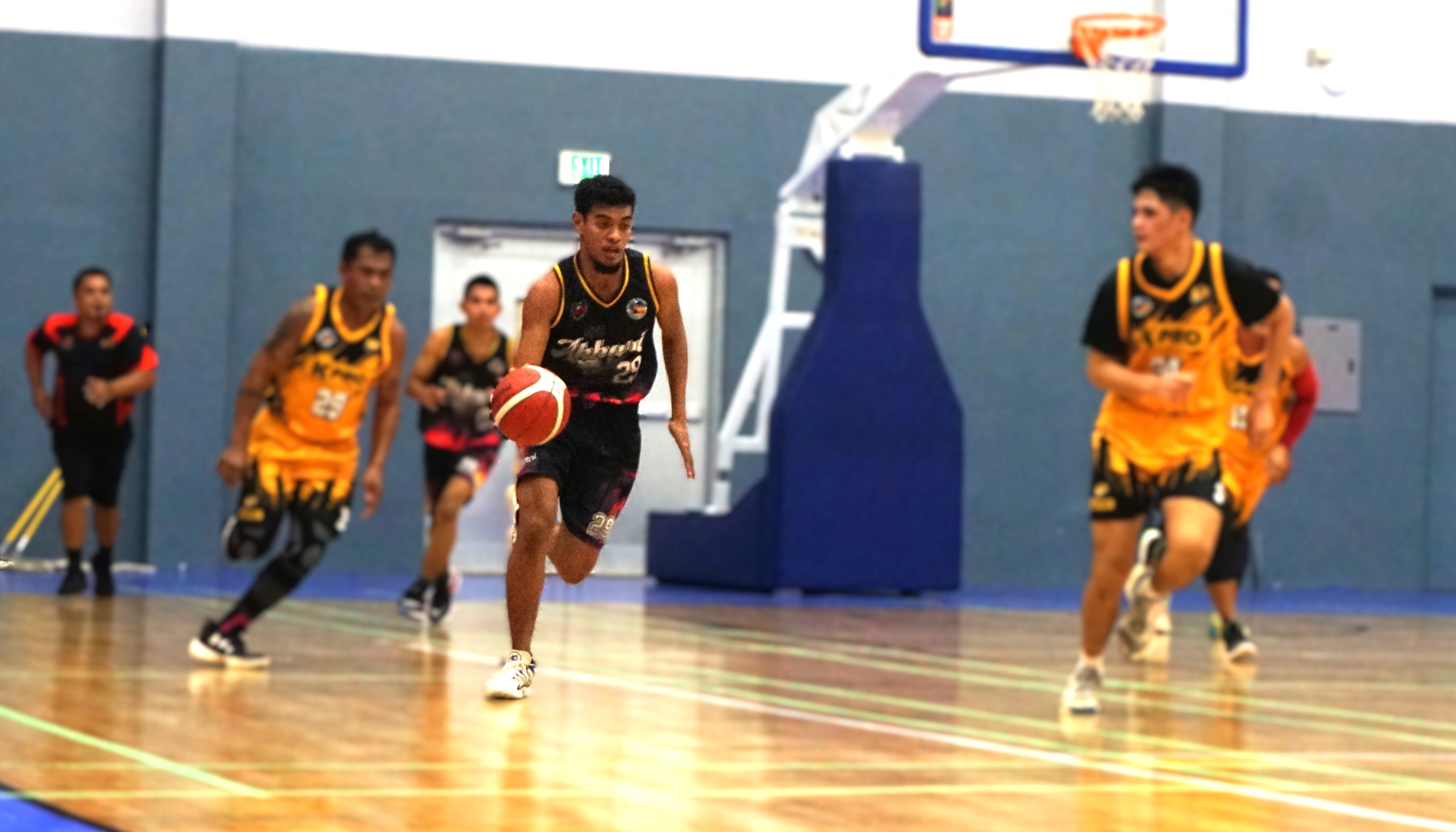 Akarri I's Frankie Satur brings down the possession against K-Pro in an open division game of the 2nd Saipan Magalahi Eagles Club – Saipan MagaHaga Lady Eagles Group Basketball Tournament at the Gilbert C. Ada gym.