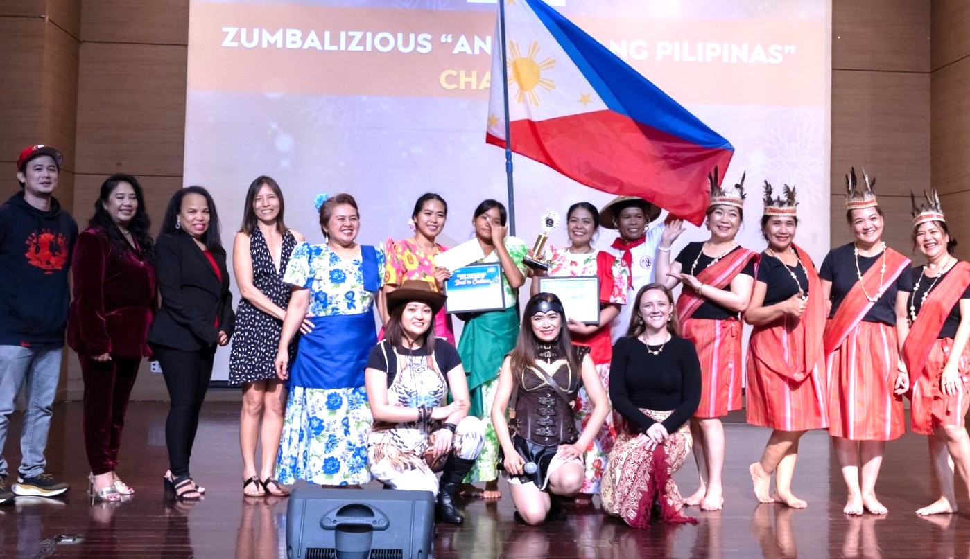 The M2 Zumbalizious dancers pose for a photo after winning the 2024 M2 Year-End Party group dance contest at the Saipan World Resort’s Taga Hall on Saturday.