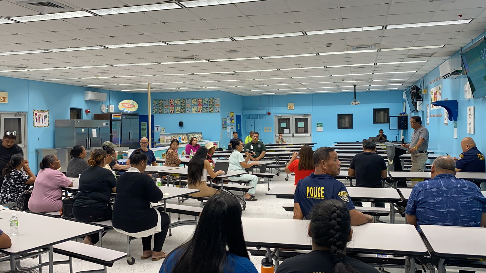 Saipan Mayor RB Camacho, far right, meets with residents of Precinct 2 in the William S. Reyes Elementary School cafeteria on Thursday, Dec. 5, 2024.