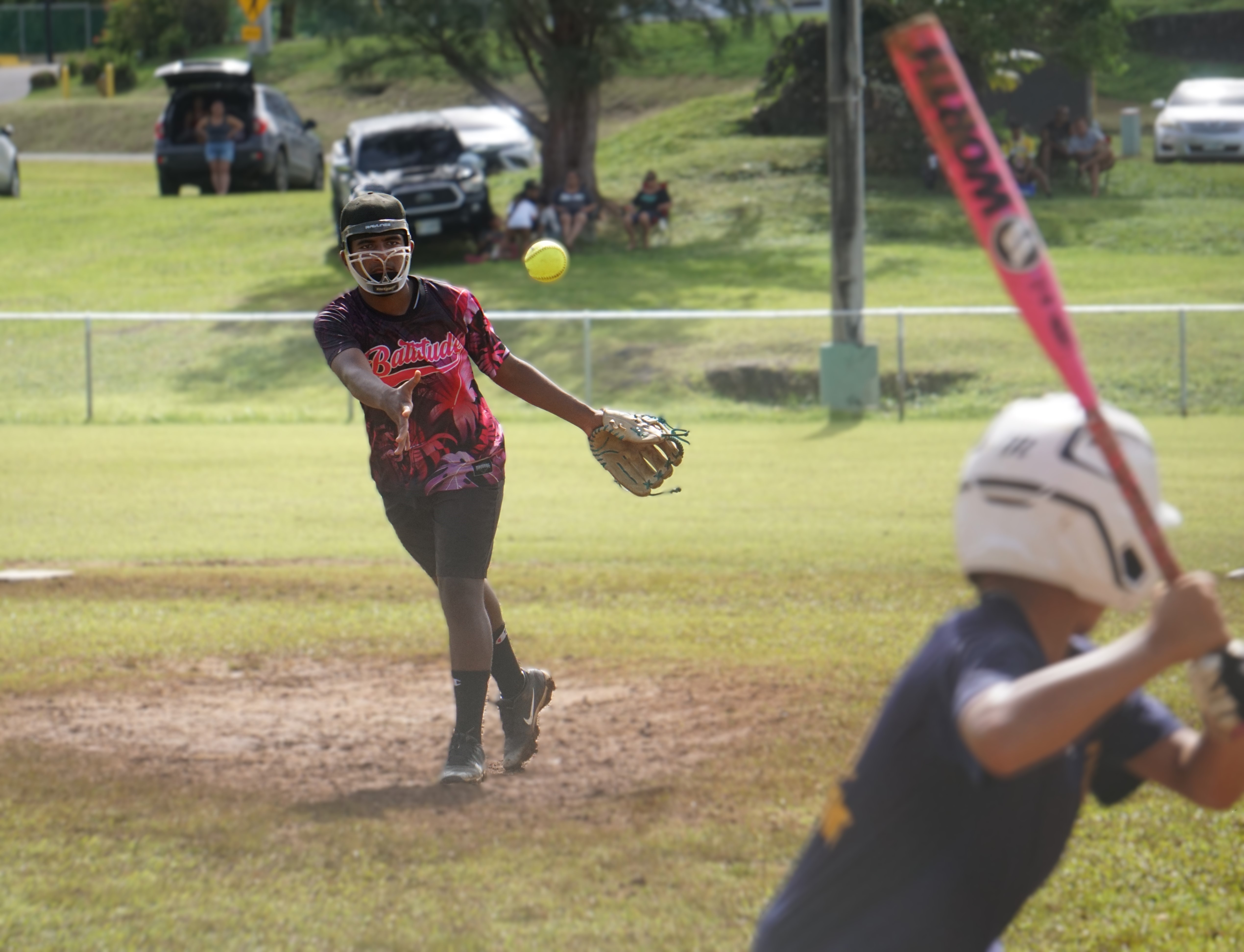Tanapag Middle School's Jesus San Nicolas pitches against Hopwood Middle School during the boys middle school division title game of the PSS-NMISA Interscholastic Fastpitch Softball League SY24-25 at the Capital Hill softball field on Saturday.