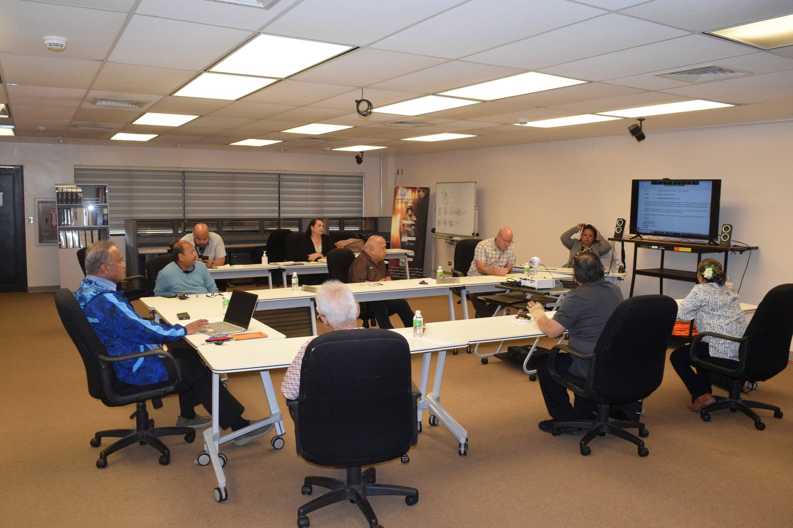Commonwealth Ports Authority Board Chair Ramon Tebuteb, left, speaks during a special meeting on Wednesday in the Aircraft Rescue and Firefighting classroom of the Francisco C. Ada/Saipan International Airport.
