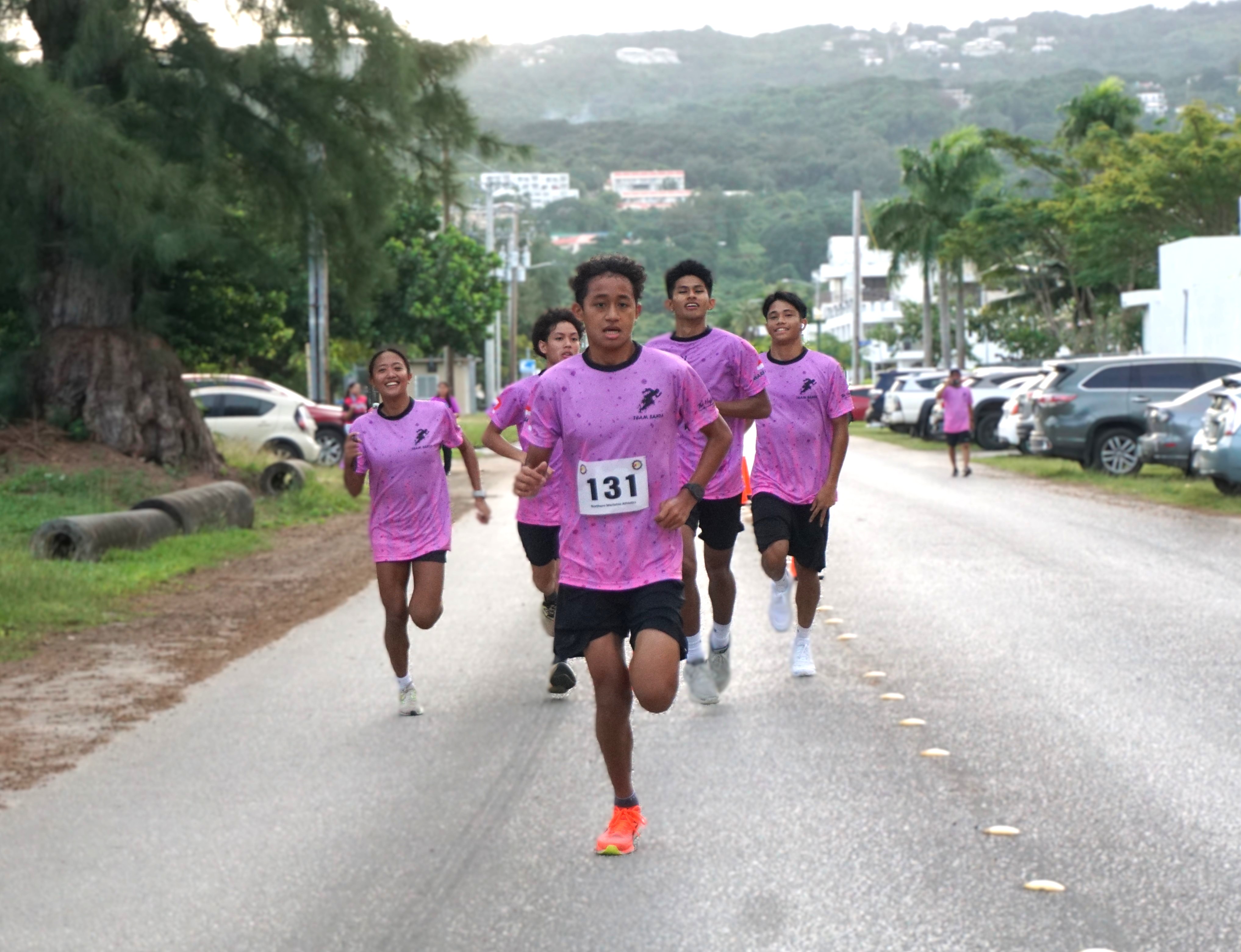 Team Santa members make their way to the finish line.
