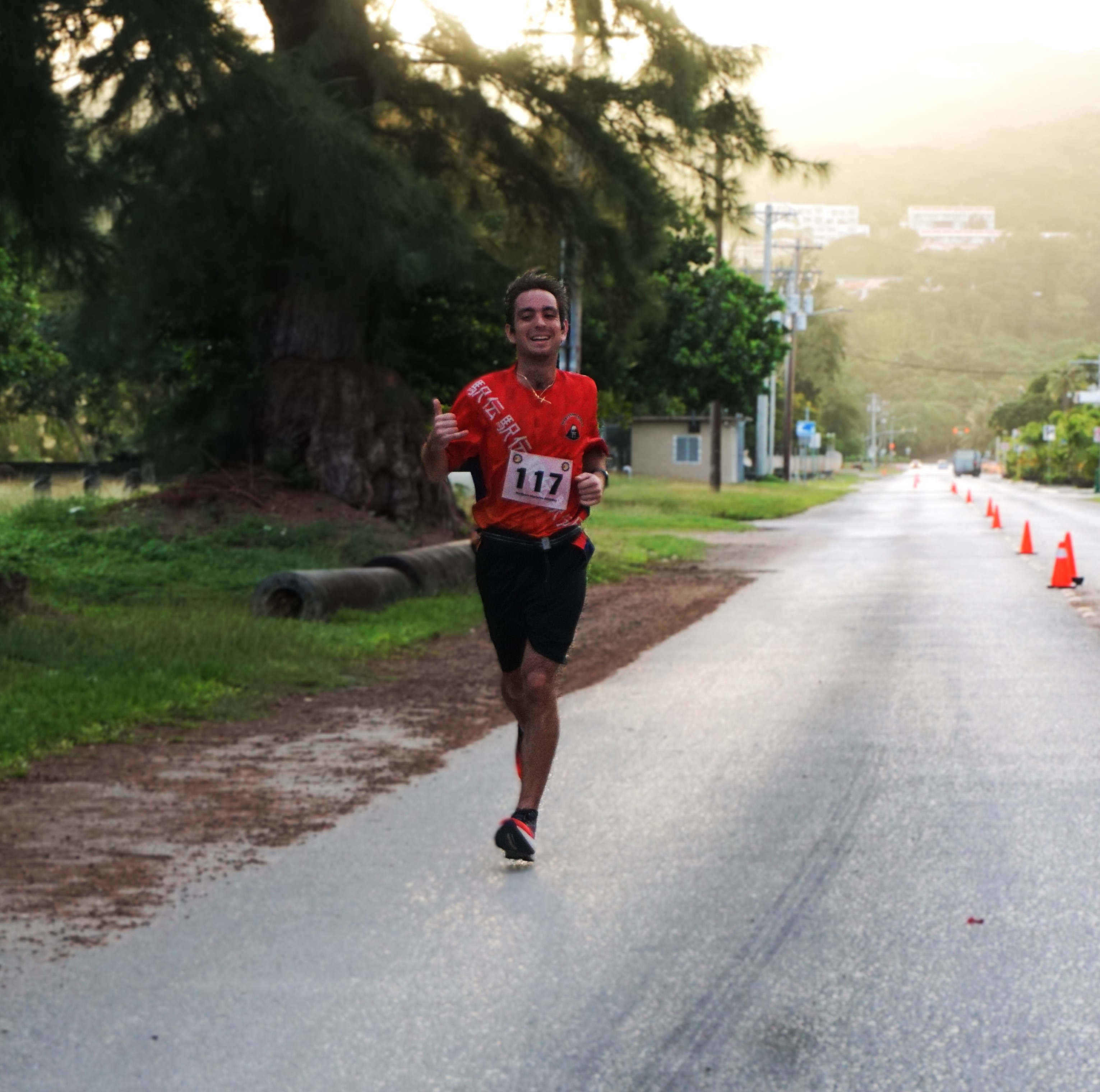 Jordan Ruiz smiles as he finishes first in the men’s solo category of Northern Marianas Athletics’ 43rd Annual Christmas Island Relay 2024 in the Marianas Beach Resort/Micro Beach area on Saturday morning.