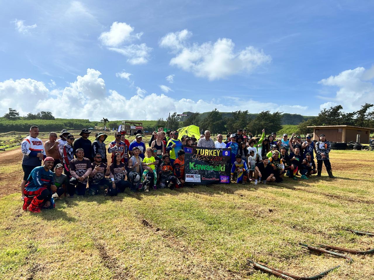 Saipan and Guam participants pose for a group photo during the Marianas Racing Association Turkey Cross 2024 at the Cow Town Raceway Park over the weekend 