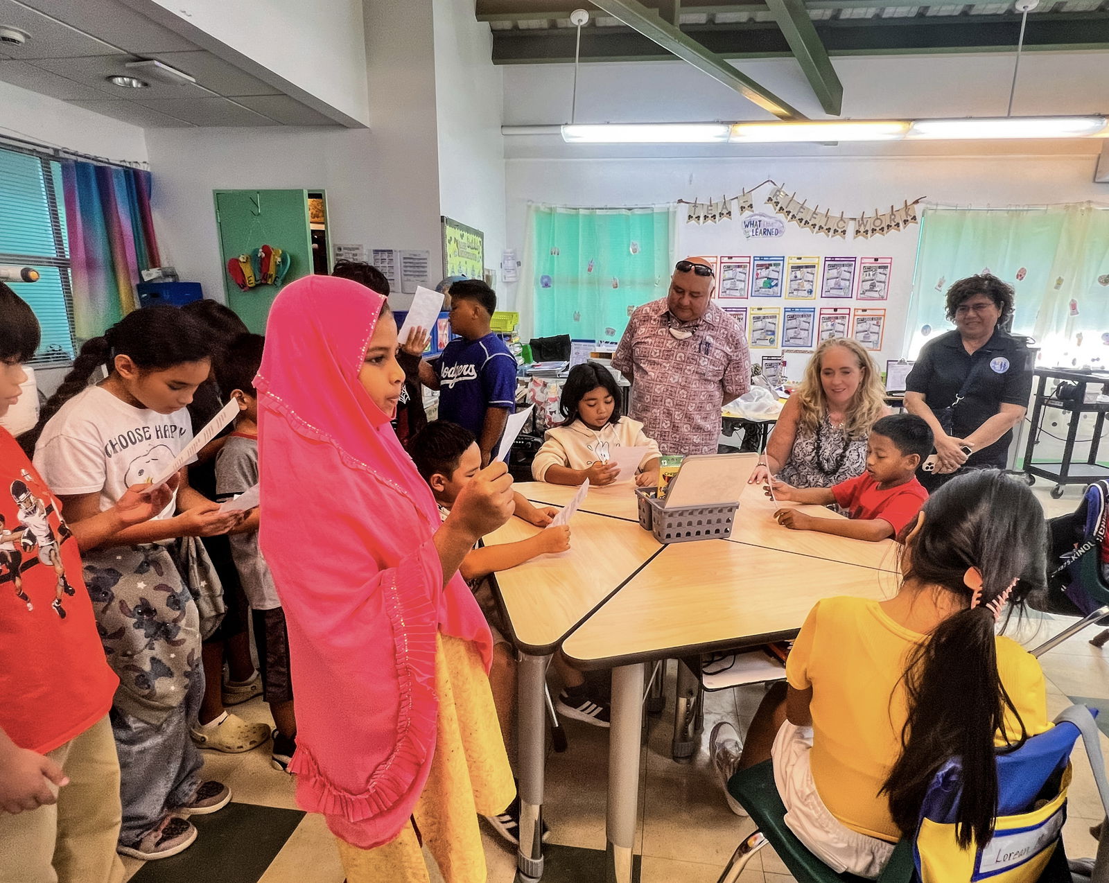 Commissioner of Education Dr. Lawrence F. Camacho and Senior Director for Instructional Services Jackie Quitugua accompanied Dr. Carissa Moffat Miller, seated right, the executive officer of the Council of Chief State Schools Officer, on a tour of Rota public schools on Nov. 25, 2024. The CCSSO is a nonpartisan organization of public officials who head the departments of elementary and secondary education throughout the United States and its territories.
