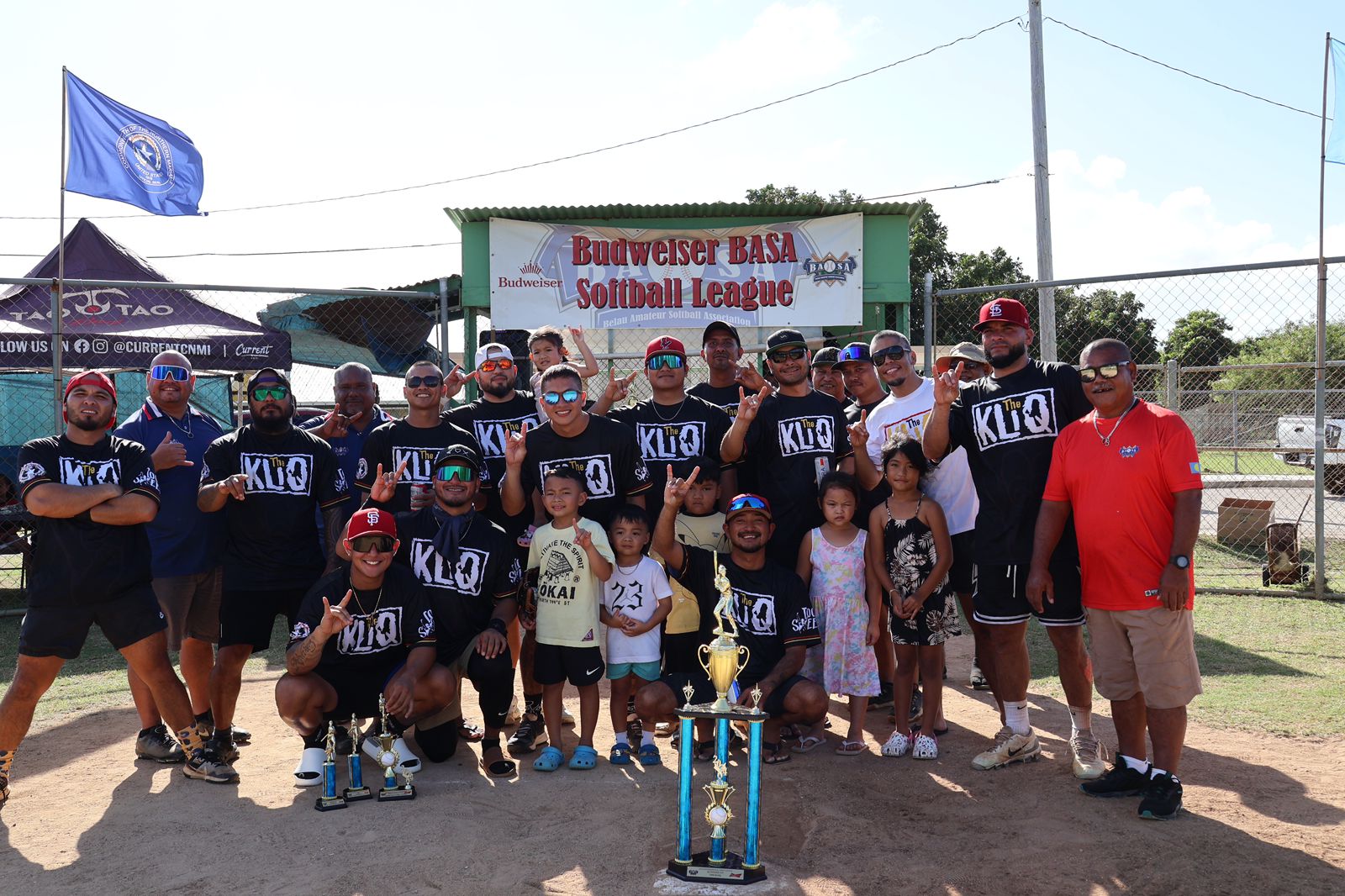 The Kliq players pose with the second-place trophy of the 2024 Budweiser Belau Amateur Softball Association Open League at the Dandan softball field on Sunday. 