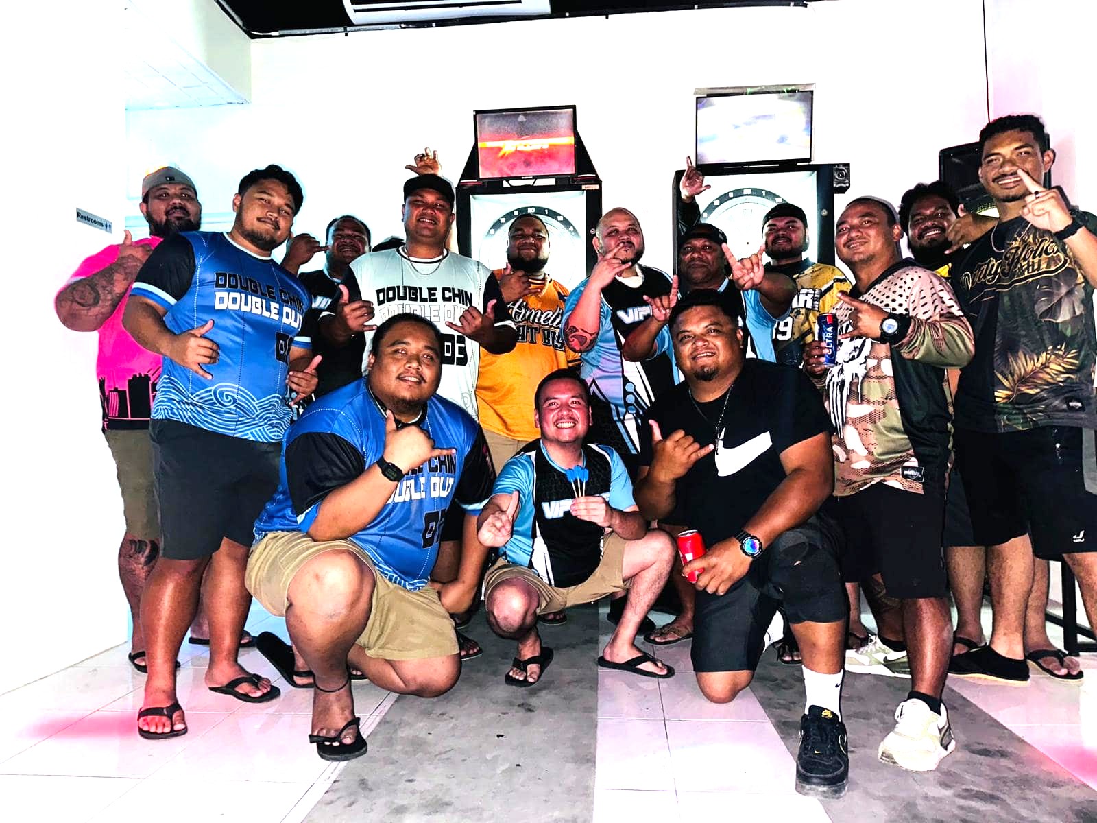 The Flamingo Tavern Vipers and the Spicy Thai Double Chin Double Out players pose for a group photo after the conclusion of their masters division championship match in this year’s SEDA Bud Light Dart League at the Flamingo Tavern on Wednesday.