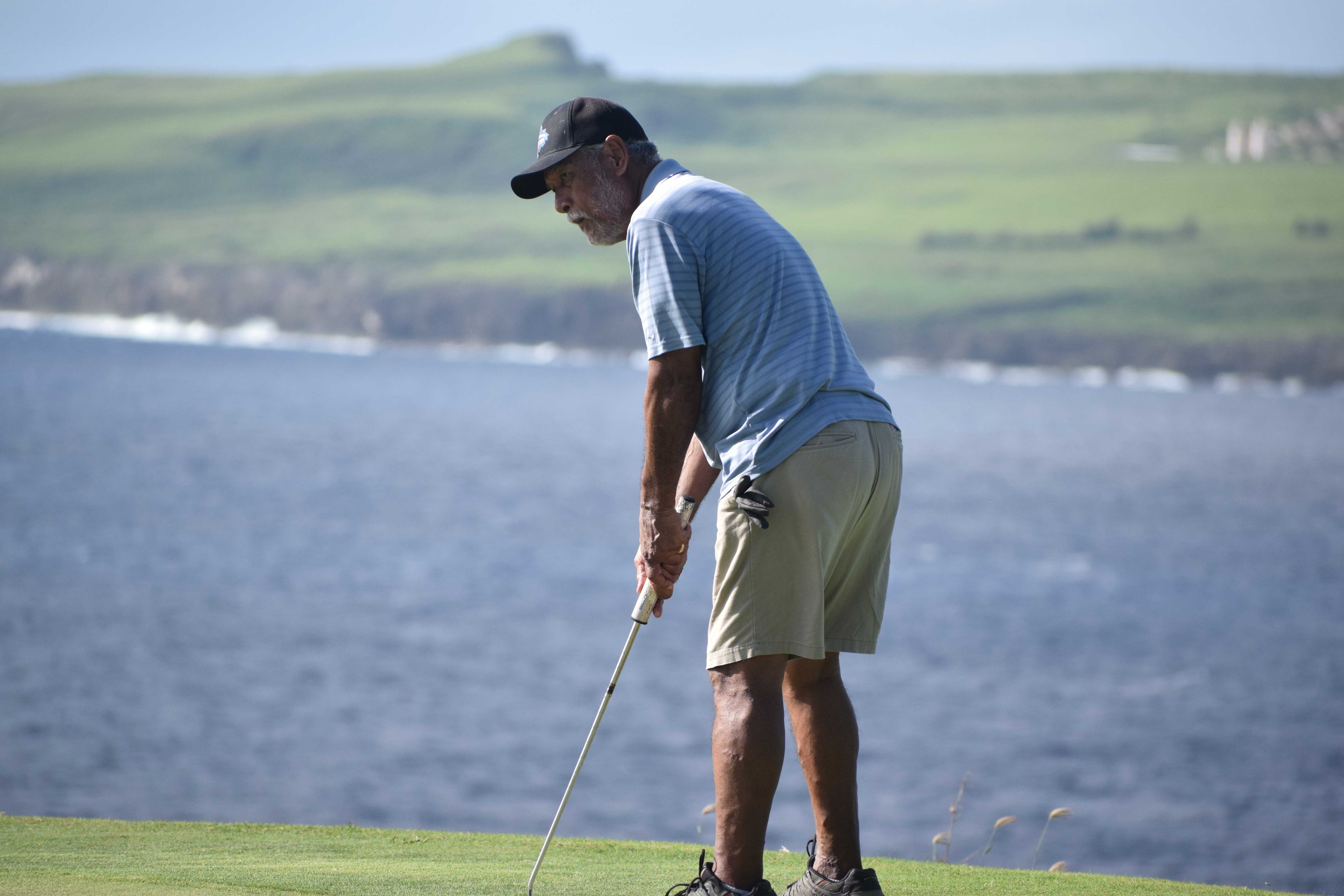 Former Northern Marianas Amateur Sports Association Executive Director Tony Rogolifoi putts on Hole No. 15.