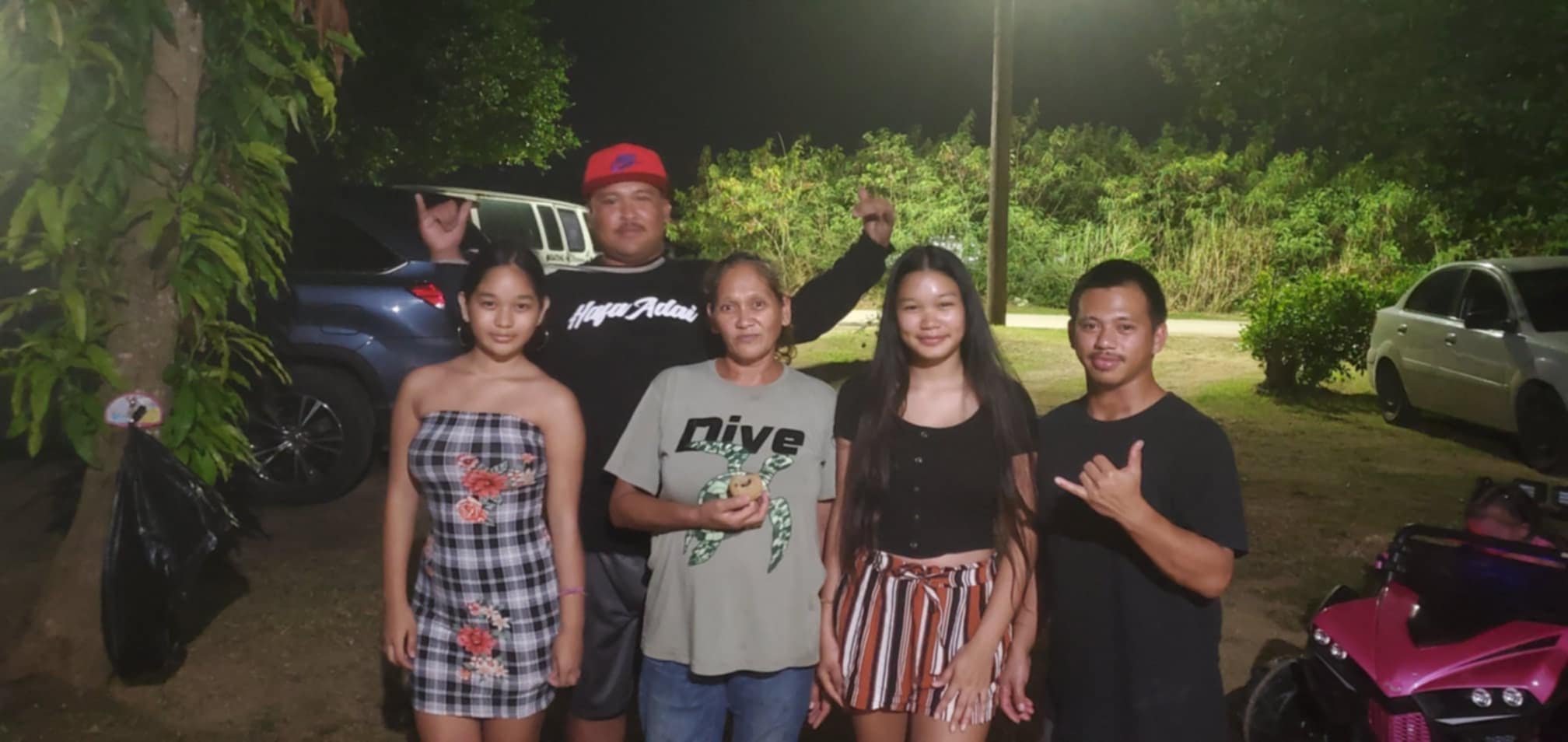 JD Delos Santos (in red cap) with his family.